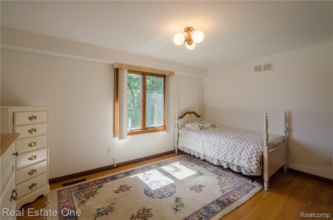 36214 Congress Road Farmington, MI 48335 - Photo 15 of 23 Bedroom w/ wood floors