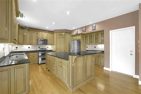 $1,095,000 | 1340 Eryn Circle, Suwanee, GA 30024