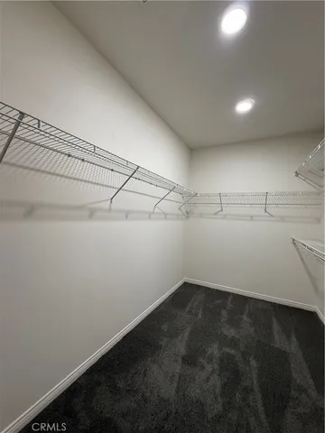 a view of a room with racks on the wall