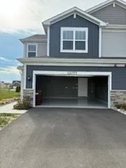 a view of an empty room with a fireplace