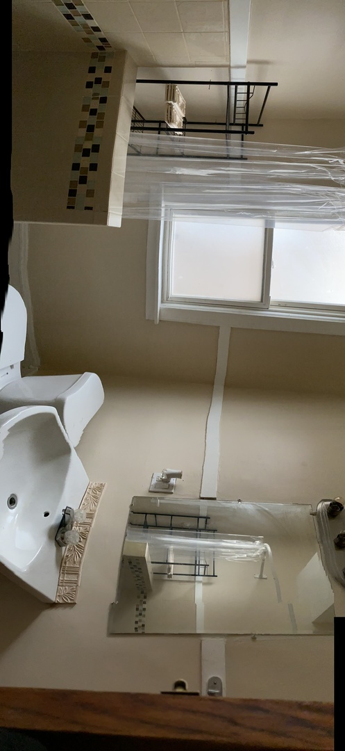 6546 South Rockwell Street, Unit 2 Chicago, IL 60629 - Photo 20 of 25 a close view of stove