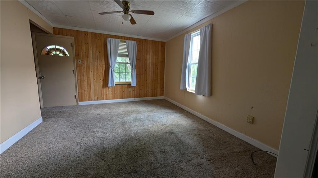 38 Ridge Road Brownsville, PA 15417 - Photo 12 of 18 an empty room with windows and ceiling fan