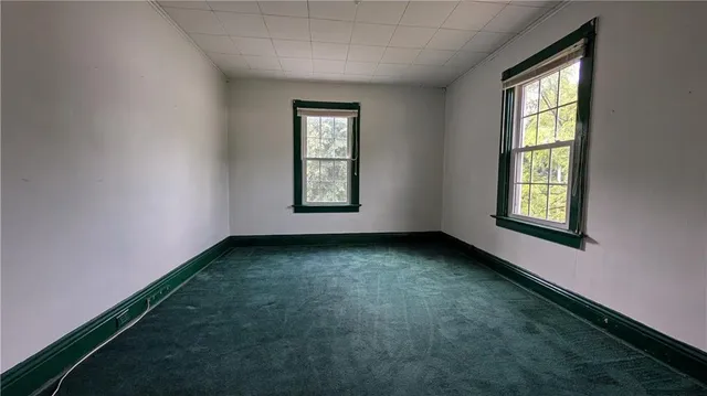 an empty room with windows