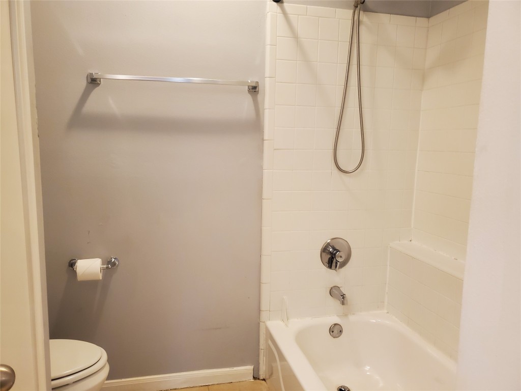 2209 Hancock Drive, Unit 16 Austin, TX 78756 - Photo 15 of 20 a bathroom with a bath tub and a shower