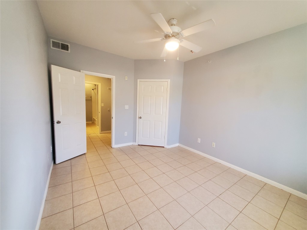 2209 Hancock Drive, Unit 16 Austin, TX 78756 - Photo 10 of 20 a view of an empty room and window