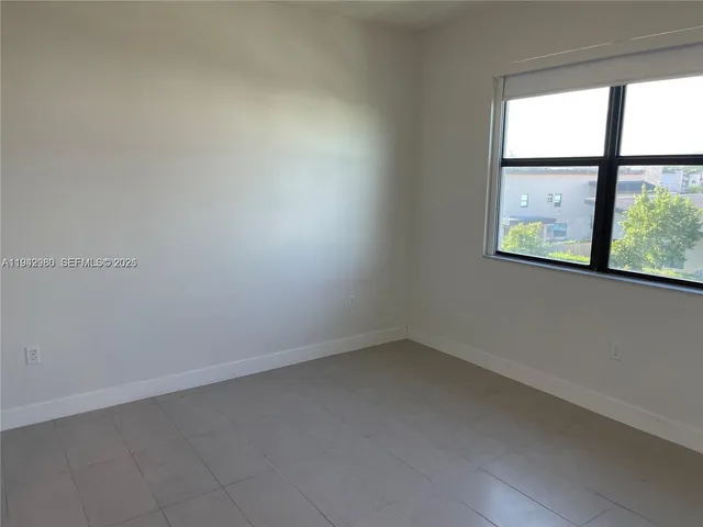 an empty room with a window