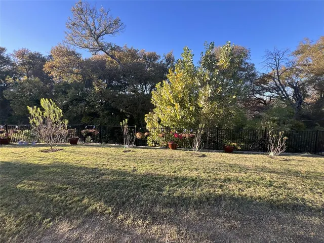 a fire hydrant in the middle of a field