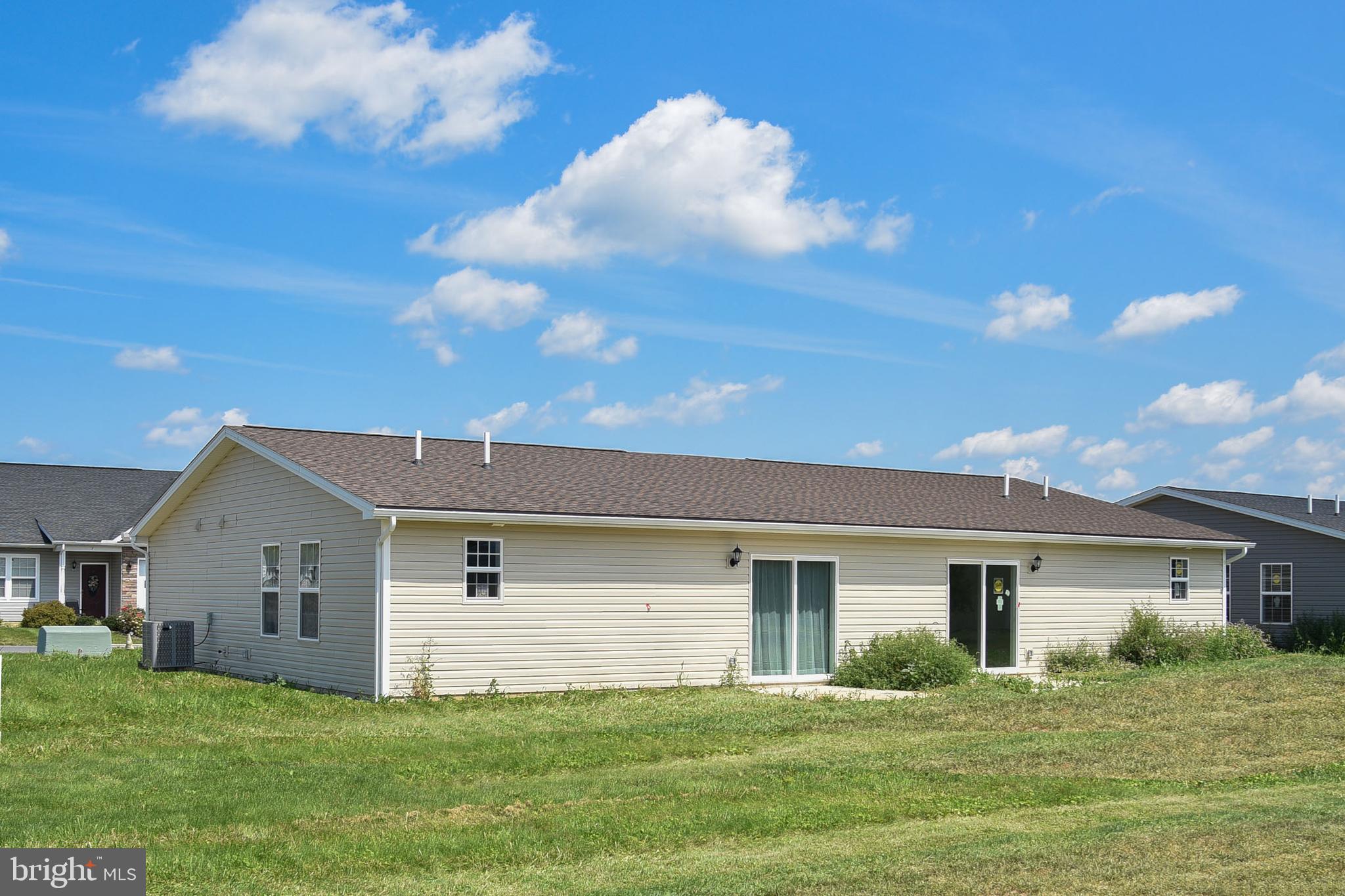 12 Pacific Avenue Milroy, PA 17063 - Photo 5 of 13 a front view of house with yard and green space