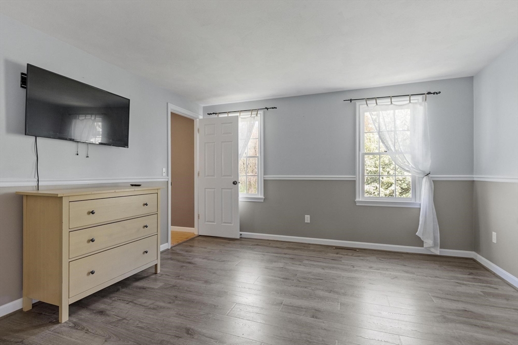 4 Ridge Road Pepperell, MA 01463 - Photo 25 of 42 a view of room with window and flat screen tv