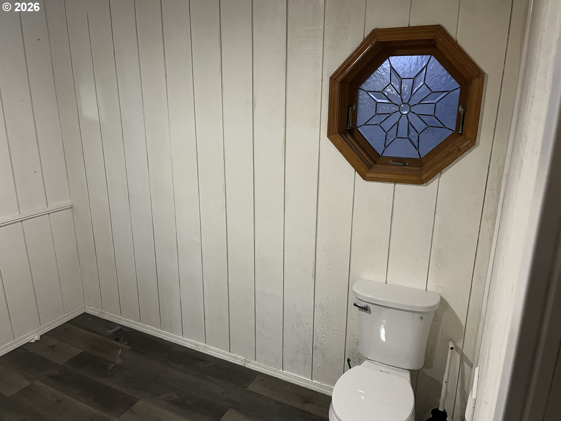 1918 Southeast 6th Avenue Camas, WA 98607 - Photo 15 of 17 a bathroom with a toilet and a painting on the wall