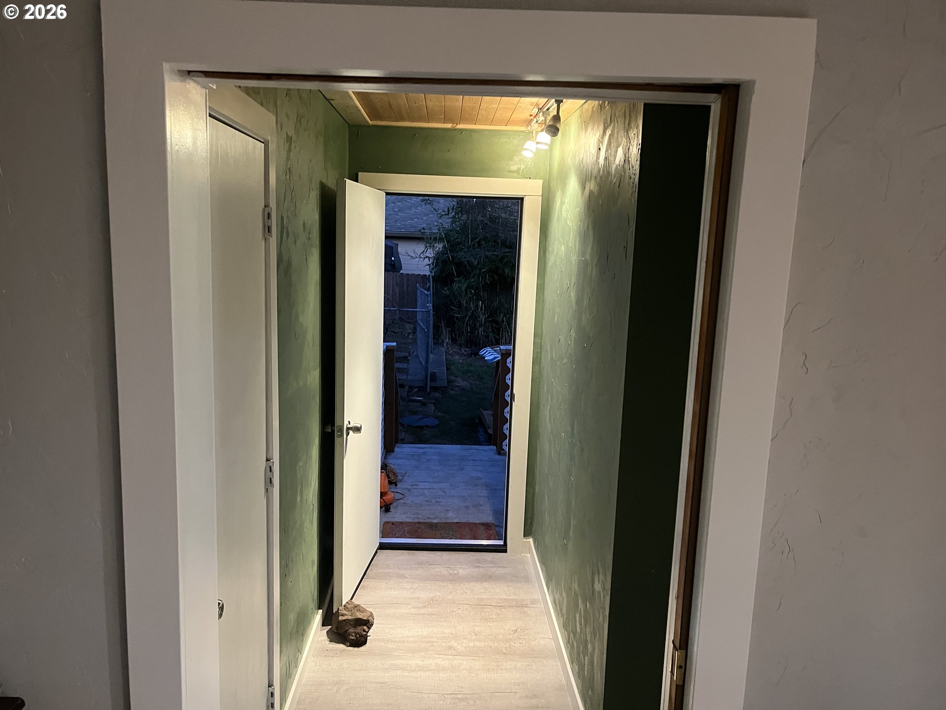 1918 Southeast 6th Avenue Camas, WA 98607 - Photo 16 of 17 a view of a hallway with wooden floor and a bathroom