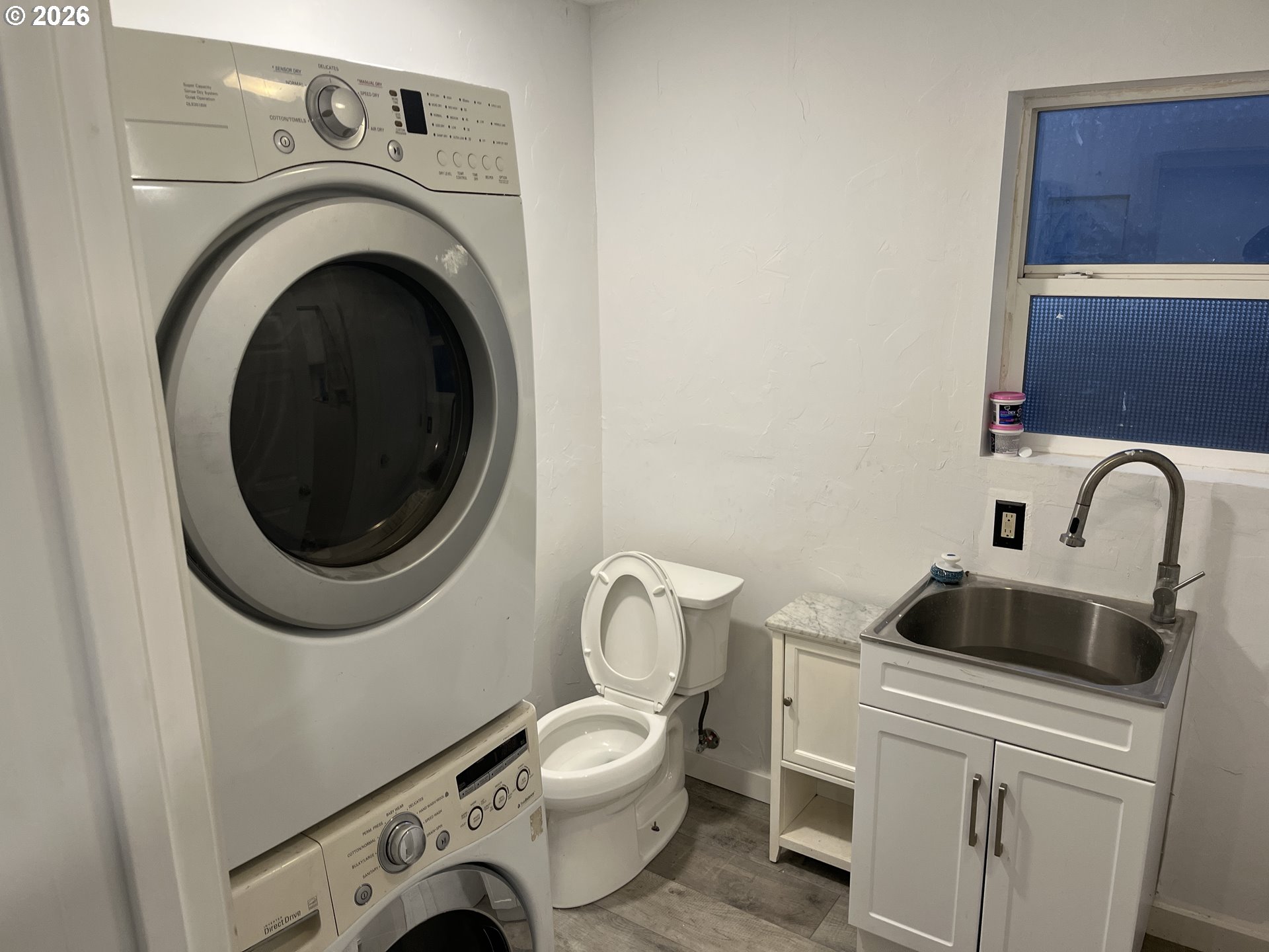 1918 Southeast 6th Avenue Camas, WA 98607 - Photo 3 of 17 a utility room with sink dryer and washer