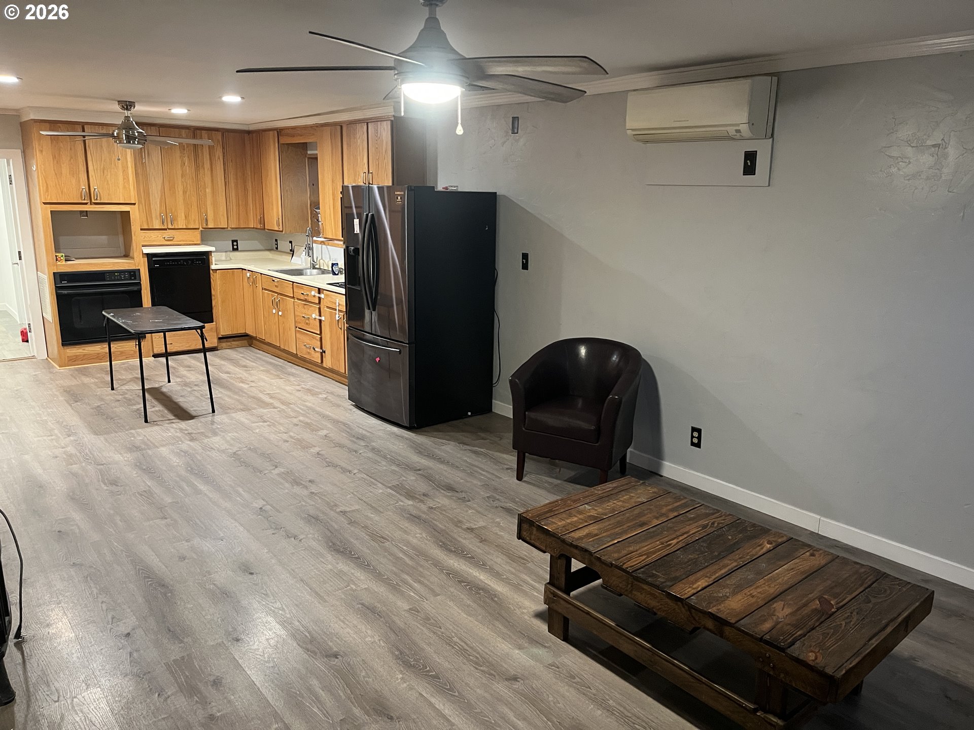 1918 Southeast 6th Avenue Camas, WA 98607 - Photo 5 of 17 a living room with stainless steel appliances furniture a refrigerator and a dining table