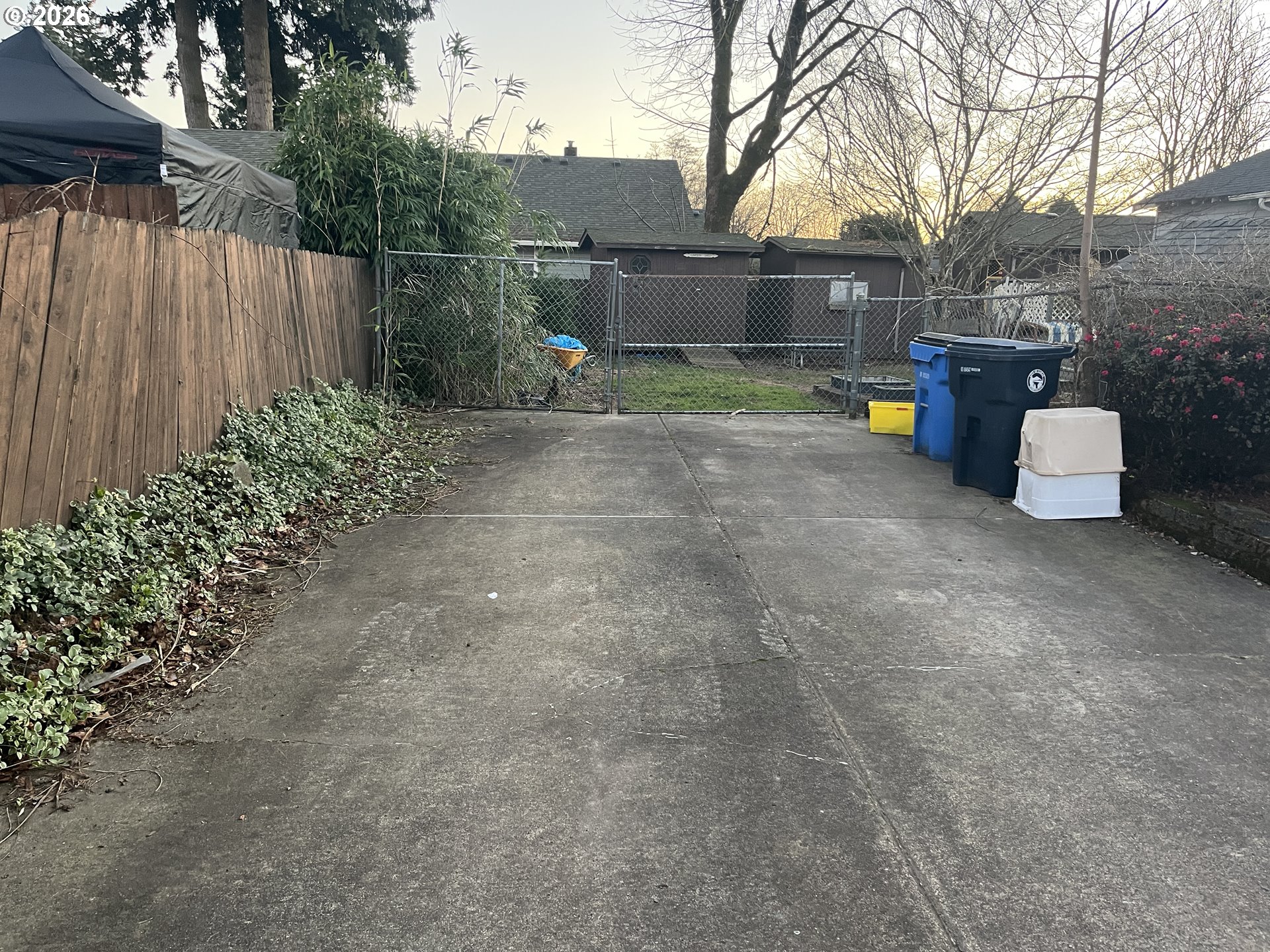 1918 Southeast 6th Avenue Camas, WA 98607 - Photo 8 of 17 a backyard of a house with barbeque oven and plants