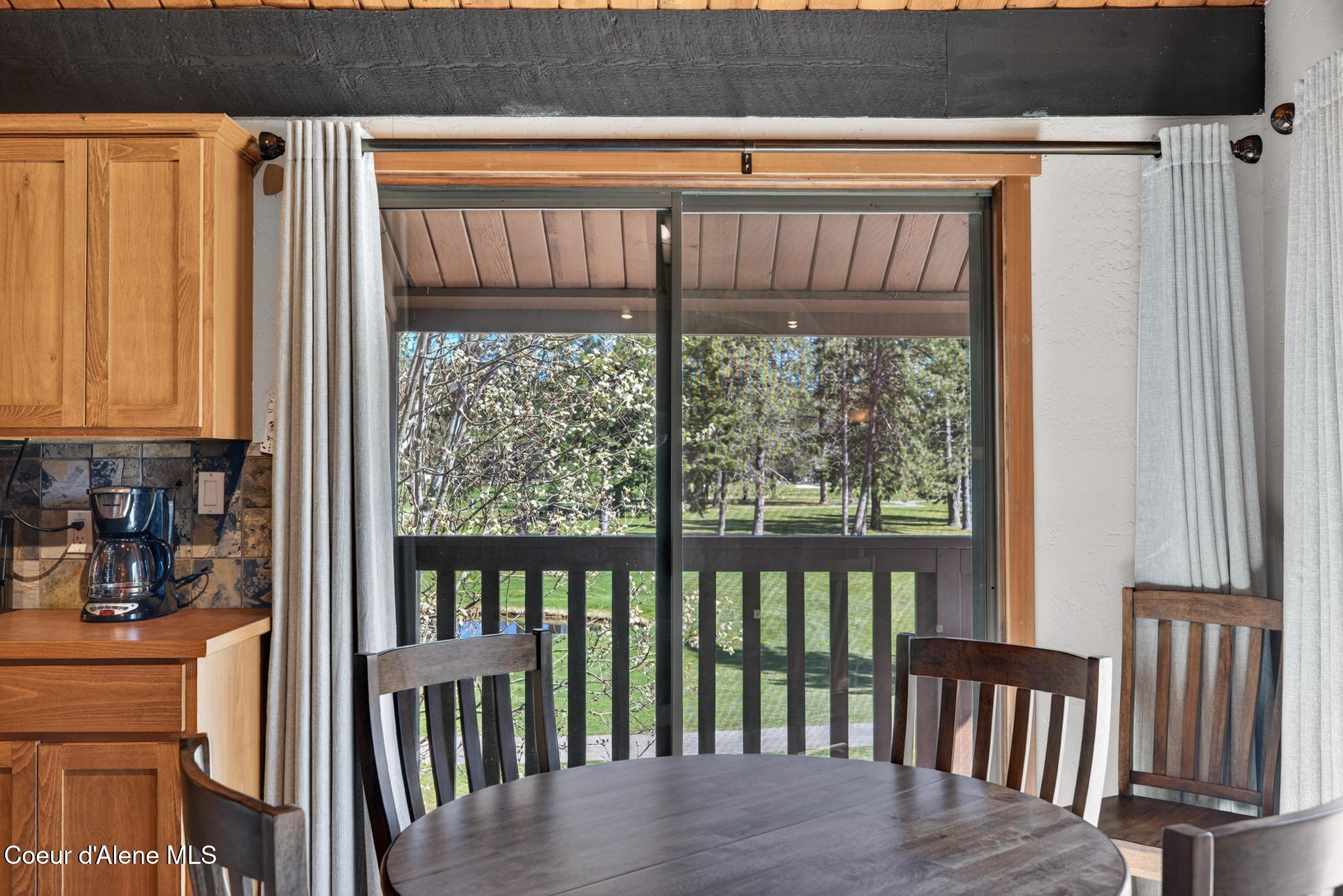 5305 West Fairway Lane, Unit 18 Rathdrum, ID 83858 - Photo 9 of 63 Back Slider Door