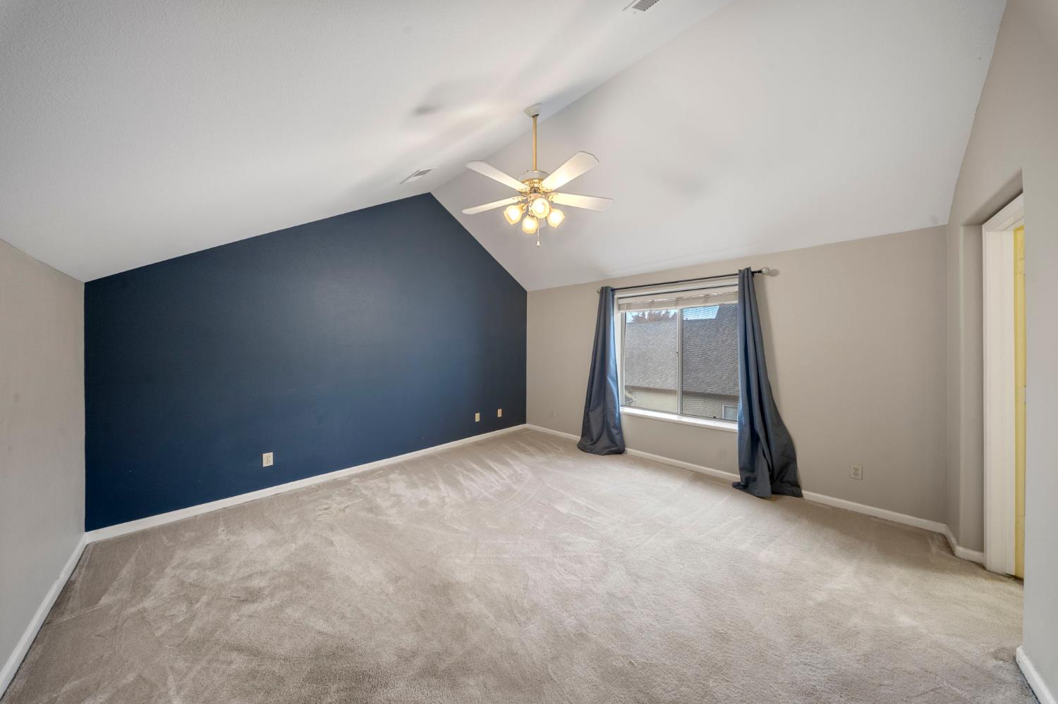 1128 Valencia Court Modesto, CA 95350 - Photo 16 of 30 a view of an empty room with a window