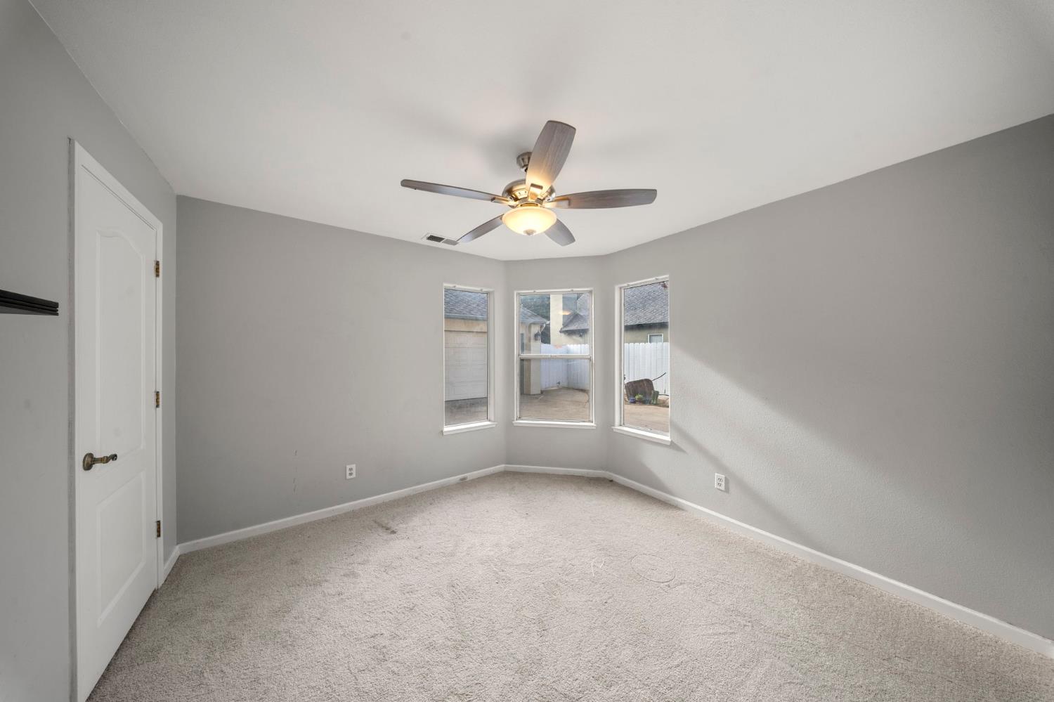 1128 Valencia Court Modesto, CA 95350 - Photo 20 of 30 a view of an empty room with a window