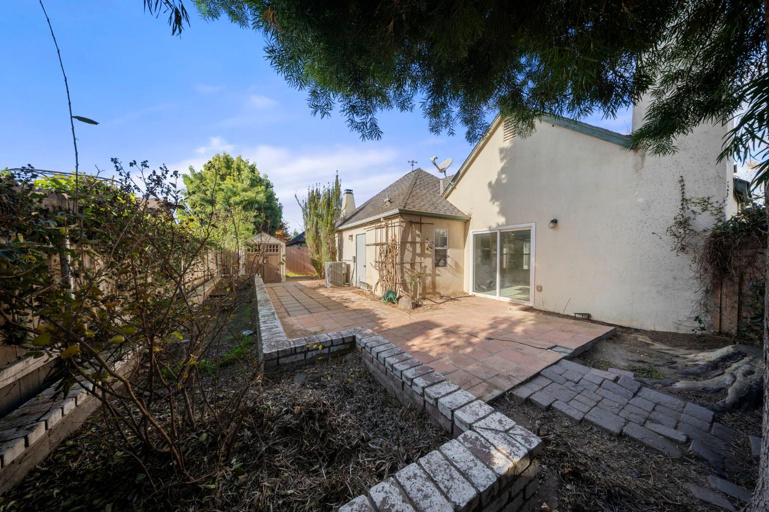 1128 Valencia Court Modesto, CA 95350 - Photo 26 of 30 a view of a house with a yard