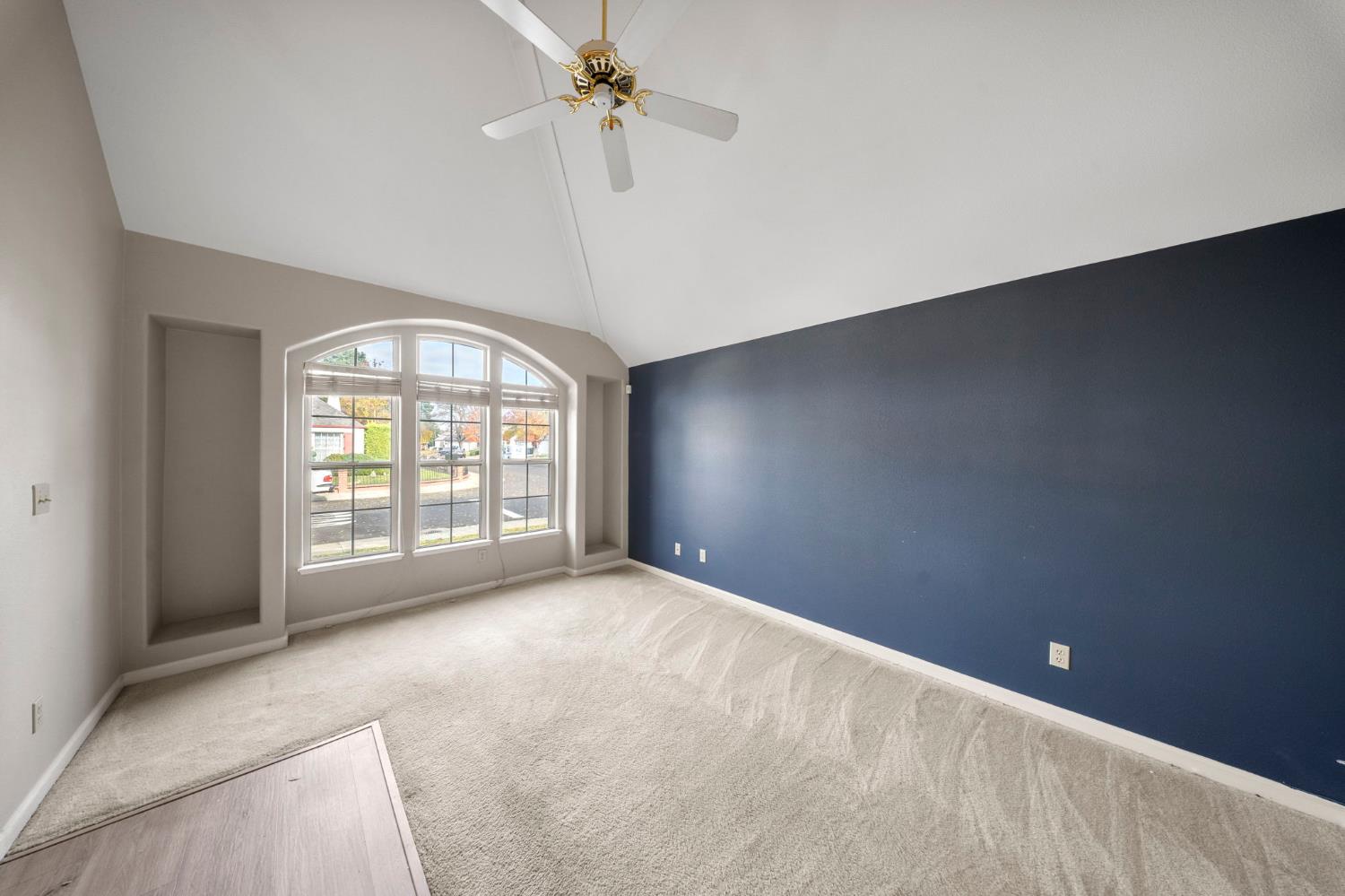 1128 Valencia Court Modesto, CA 95350 - Photo 6 of 30 an empty room with a empty space and windows