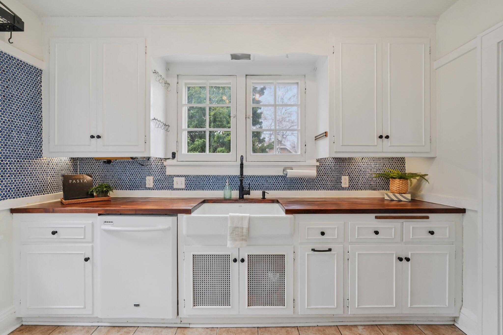 5671 North Bay Ridge Avenue Whitefish Bay, WI 53217 - Photo 12 of 39 Wonderful over-the-sink window overlooks back yard.