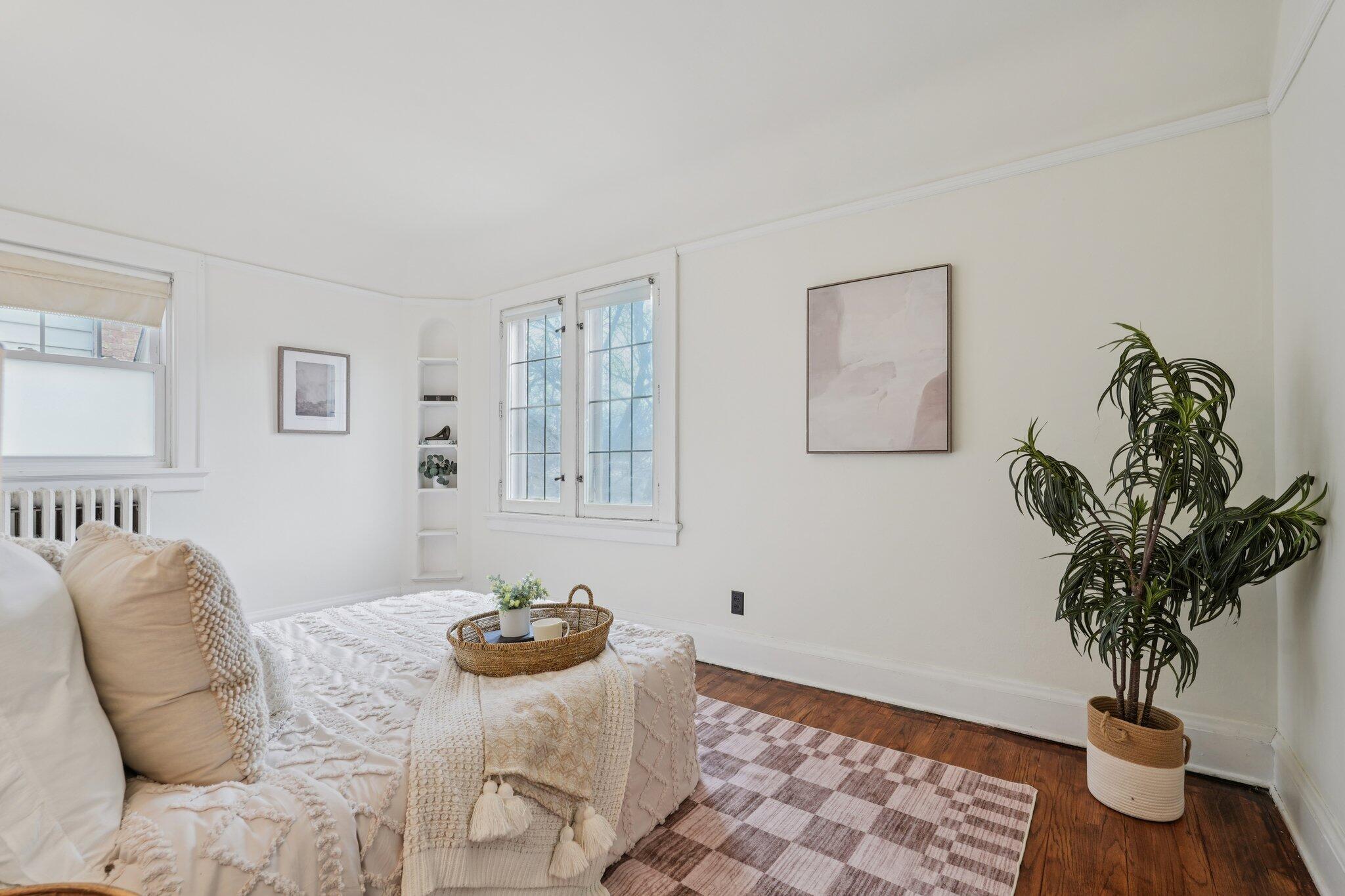 5671 North Bay Ridge Avenue Whitefish Bay, WI 53217 - Photo 15 of 39 Lead-glass windows (on 2nd floor!) along with another built-in shelving alcove.