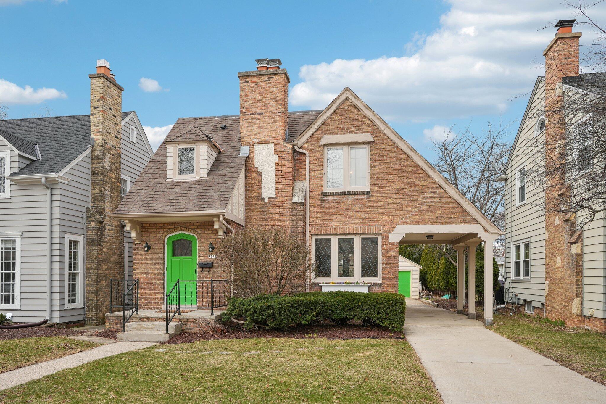 5671 North Bay Ridge Avenue Whitefish Bay, WI 53217 - Photo 2 of 39 Unique carport convenient during snow/rain storms!