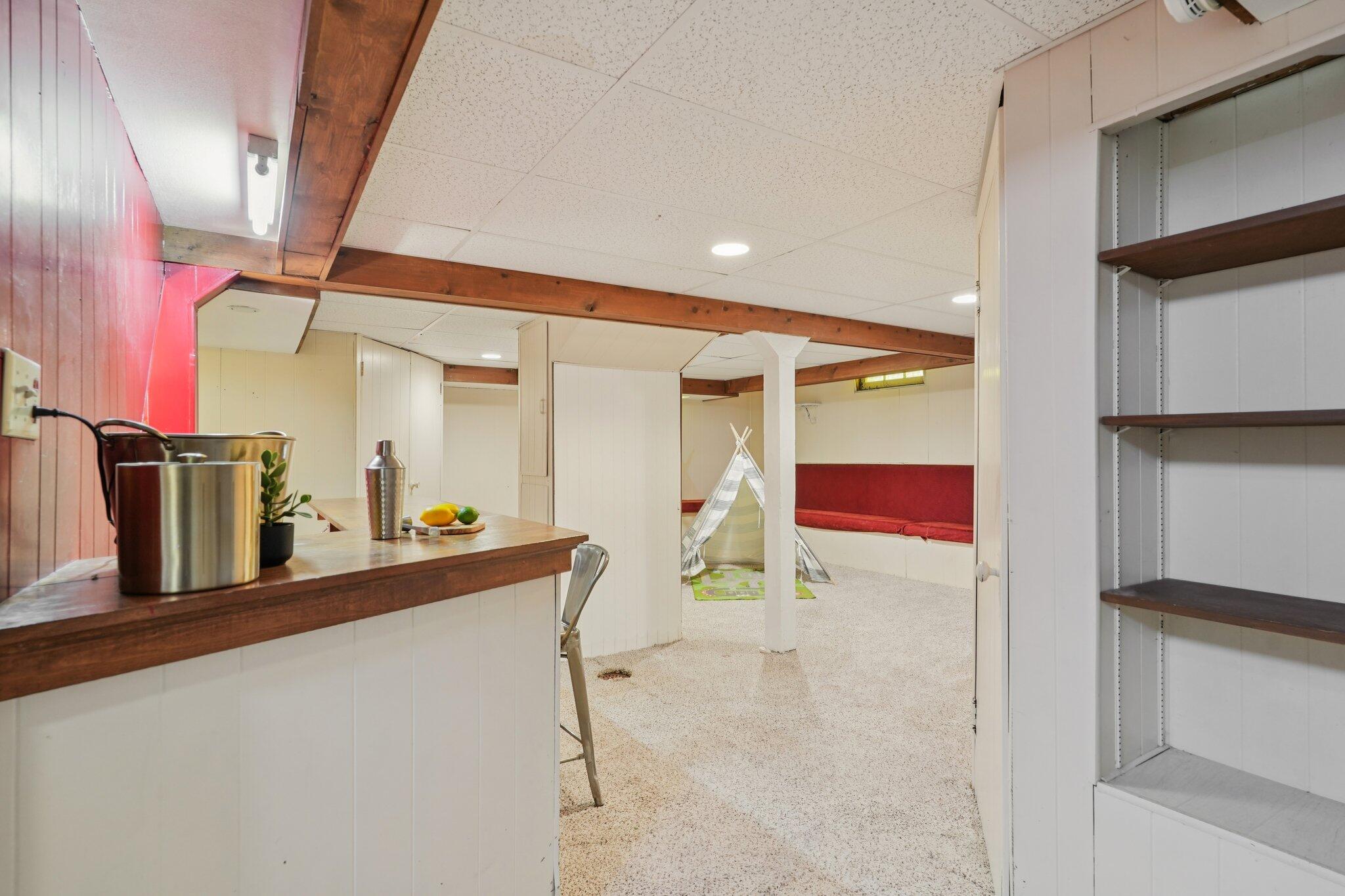 5671 North Bay Ridge Avenue Whitefish Bay, WI 53217 - Photo 25 of 39 Divided into 2 sections -> bar area + rec room.