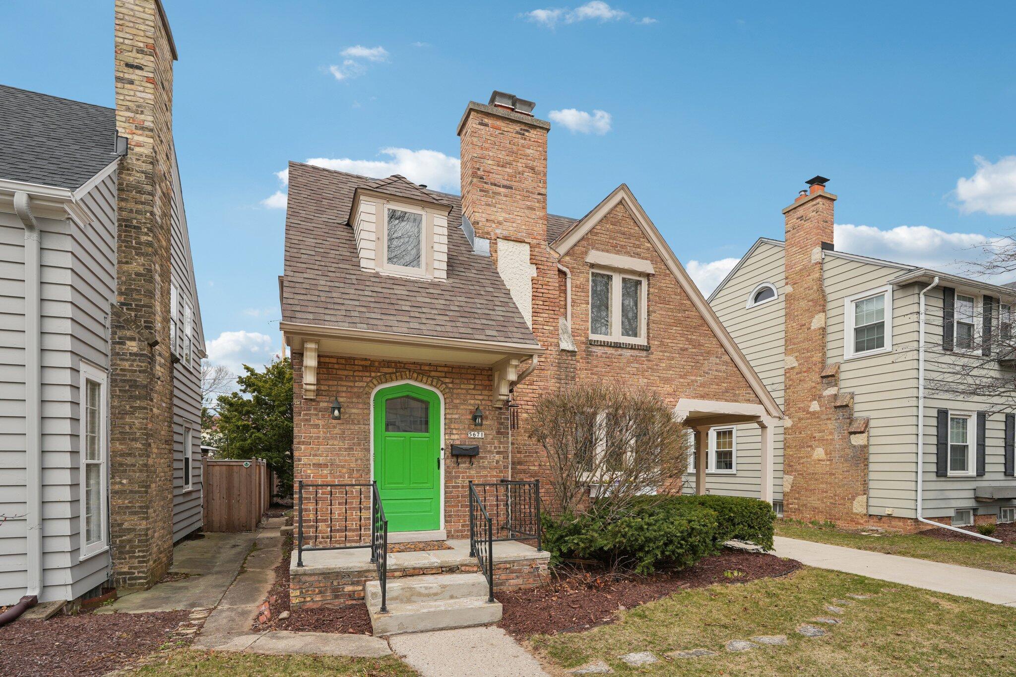 5671 North Bay Ridge Avenue Whitefish Bay, WI 53217 - Photo 3 of 39 Take note of exquisite exterior Tudor craftsmanship.