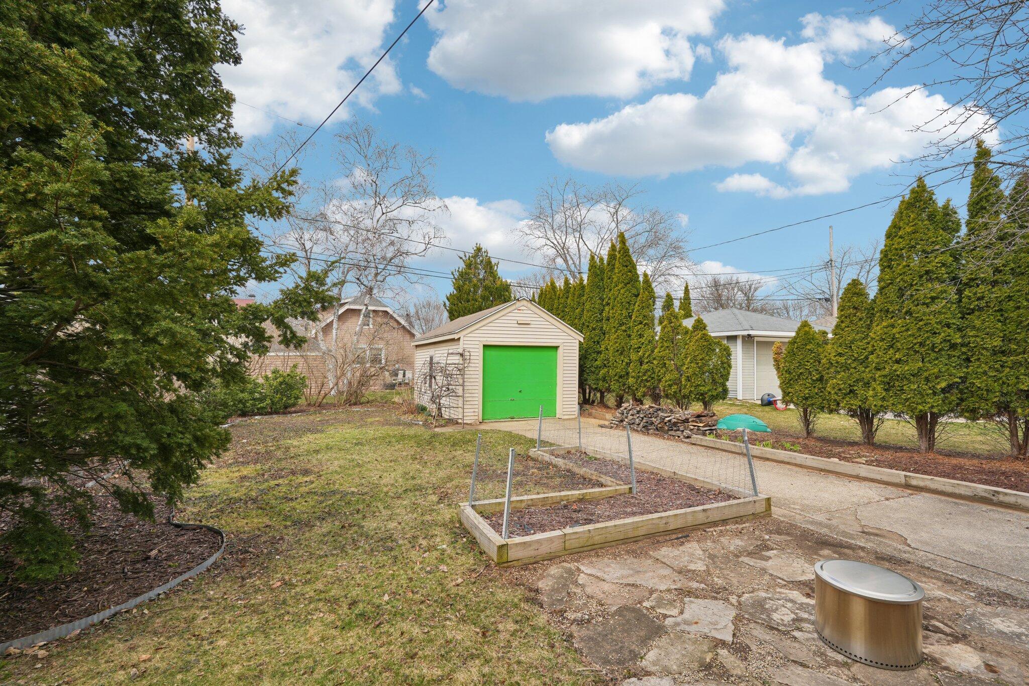 5671 North Bay Ridge Avenue Whitefish Bay, WI 53217 - Photo 30 of 39 Planter box + patio = healthy meals under stars.