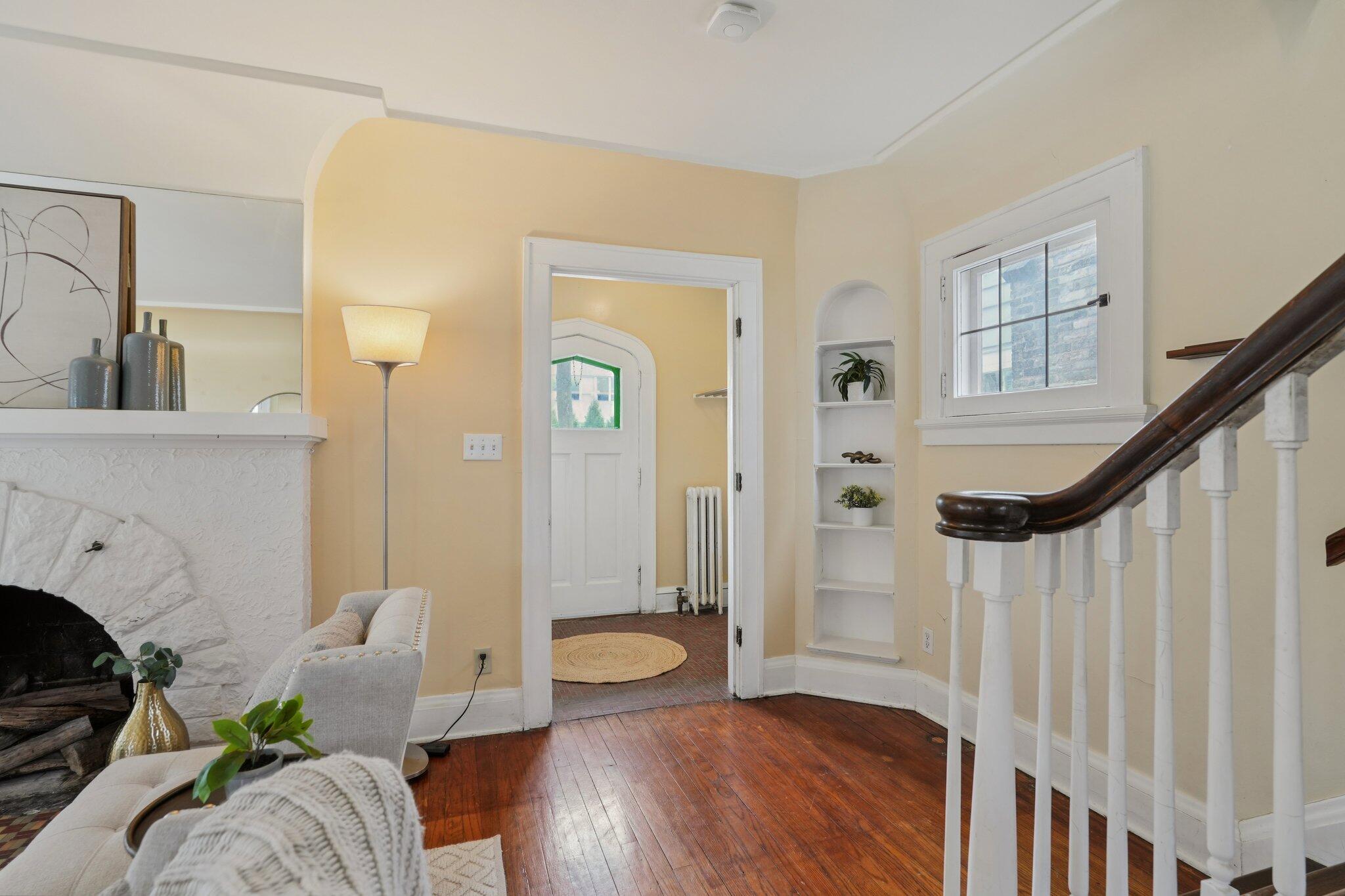 5671 North Bay Ridge Avenue Whitefish Bay, WI 53217 - Photo 4 of 39 Coat closet tucked away in foyer to left. Note first of many built-in shelving alcoves.