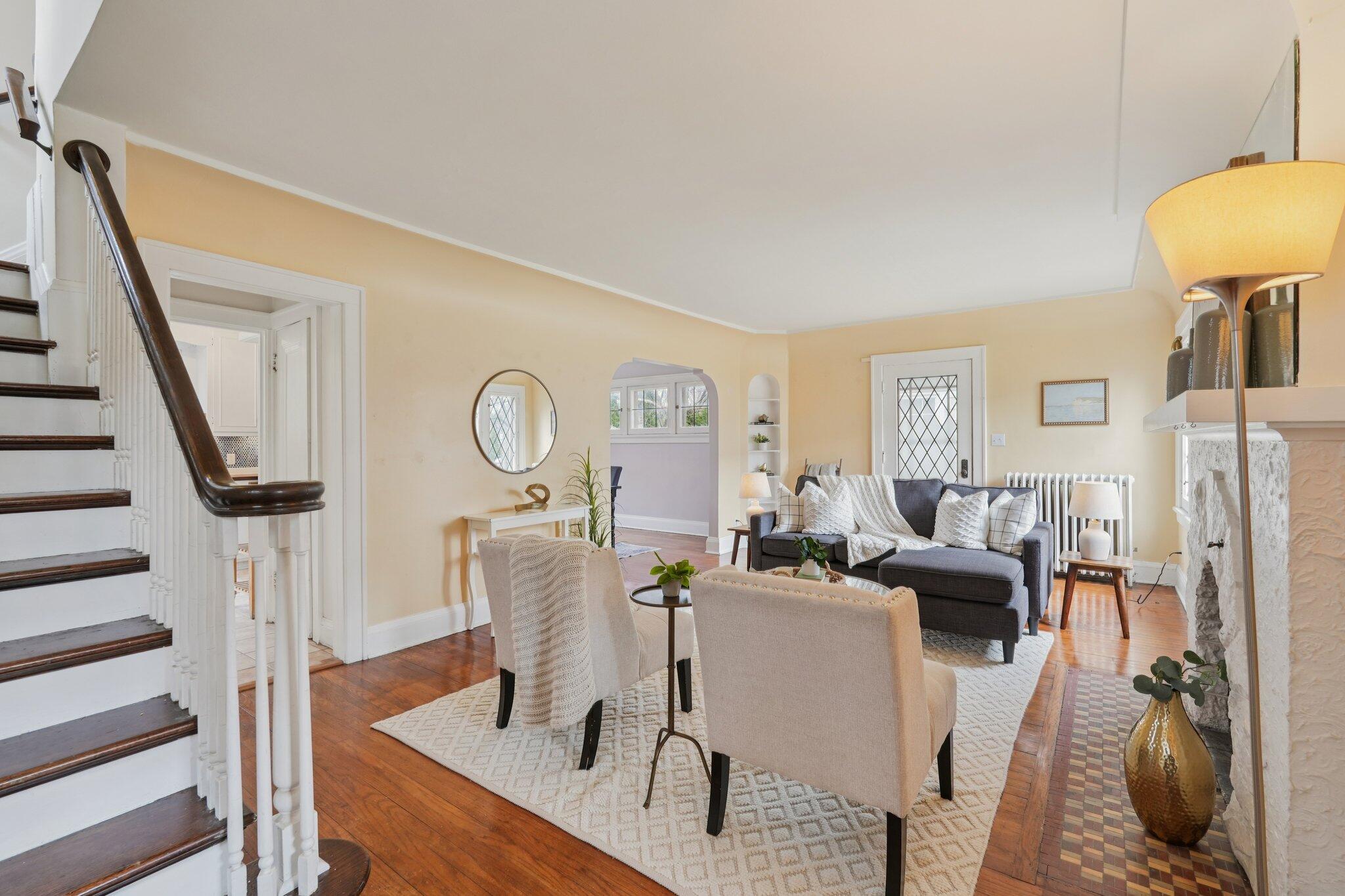 5671 North Bay Ridge Avenue Whitefish Bay, WI 53217 - Photo 5 of 39 Beautiful open staircase. Note second of many built-in shelving alcoves.