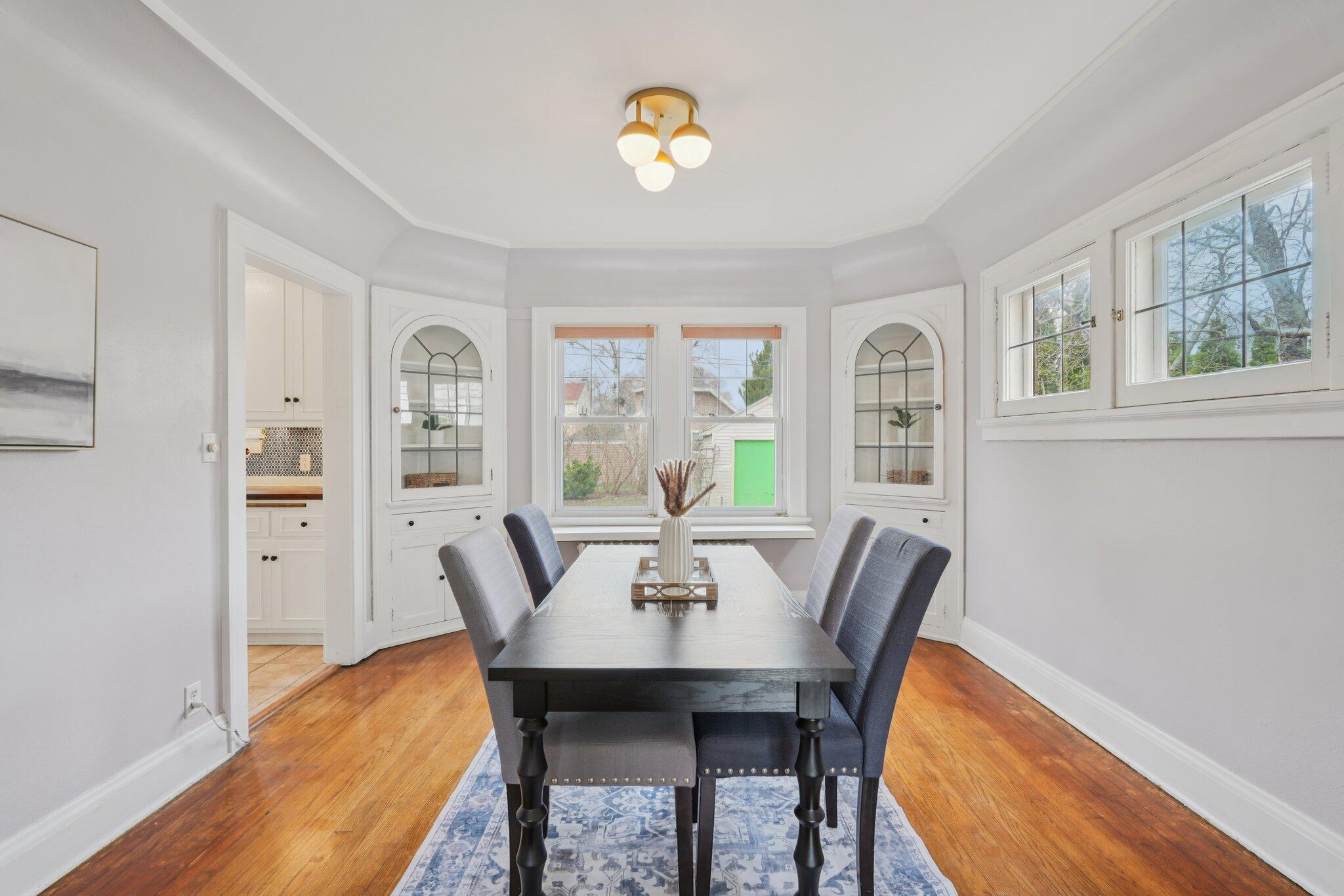 5671 North Bay Ridge Avenue Whitefish Bay, WI 53217 - Photo 8 of 39 Coved ceiling and built-in china cabinets.