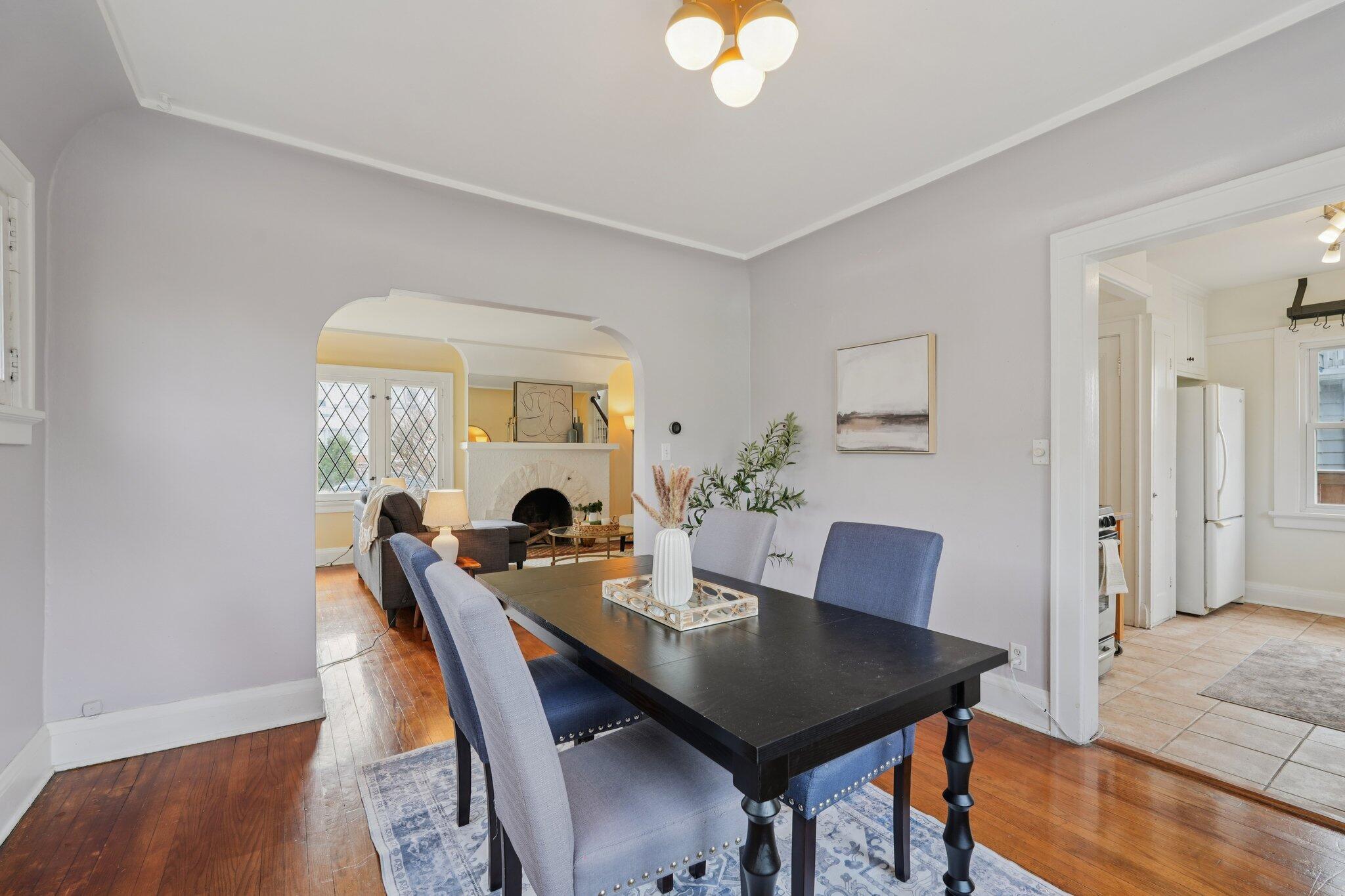 5671 North Bay Ridge Avenue Whitefish Bay, WI 53217 - Photo 9 of 39 Cool arched doorway frames living room nicely.