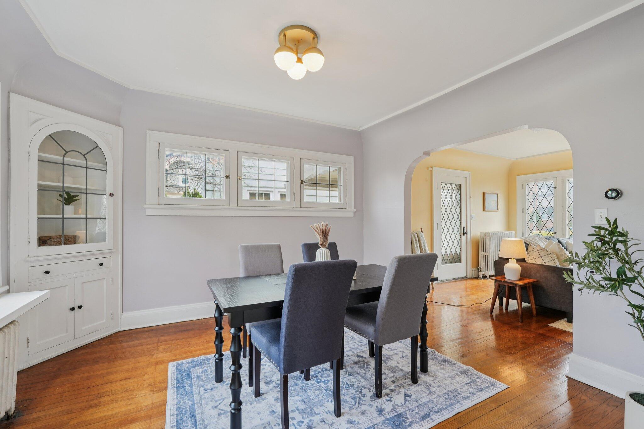 5671 North Bay Ridge Avenue Whitefish Bay, WI 53217 - Photo 10 of 39 Up-high leaded-glass windows allow for more natural light while blocking neighbor's view.