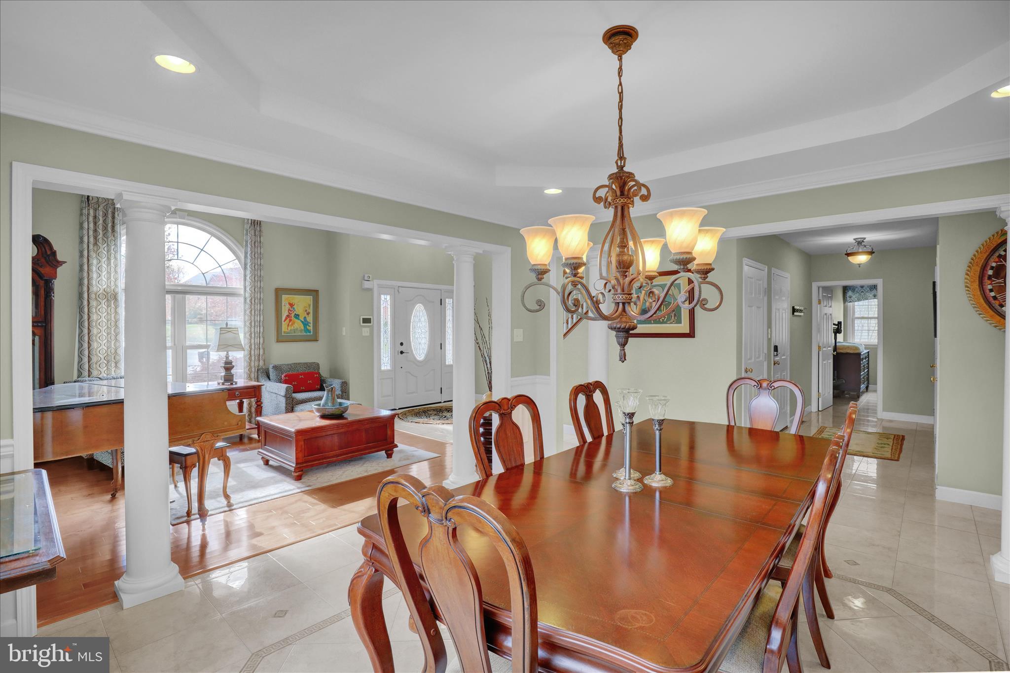 35 Pacific Avenue Sinking Spring, PA 19608 - Photo 12 of 63 a dining room with furniture a chandelier and window