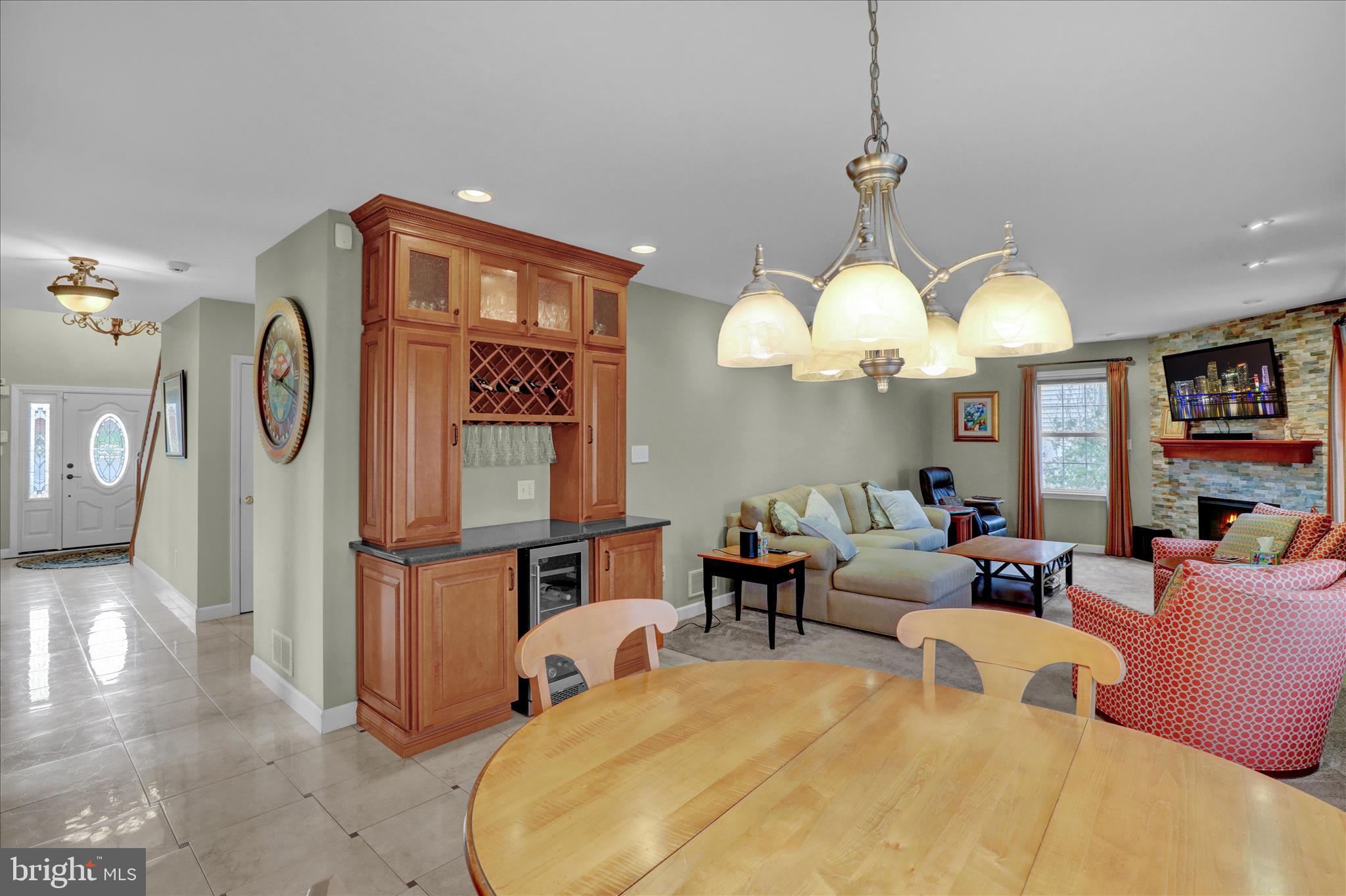 35 Pacific Avenue Sinking Spring, PA 19608 - Photo 19 of 63 a living room with furniture a chandelier and a large mirror