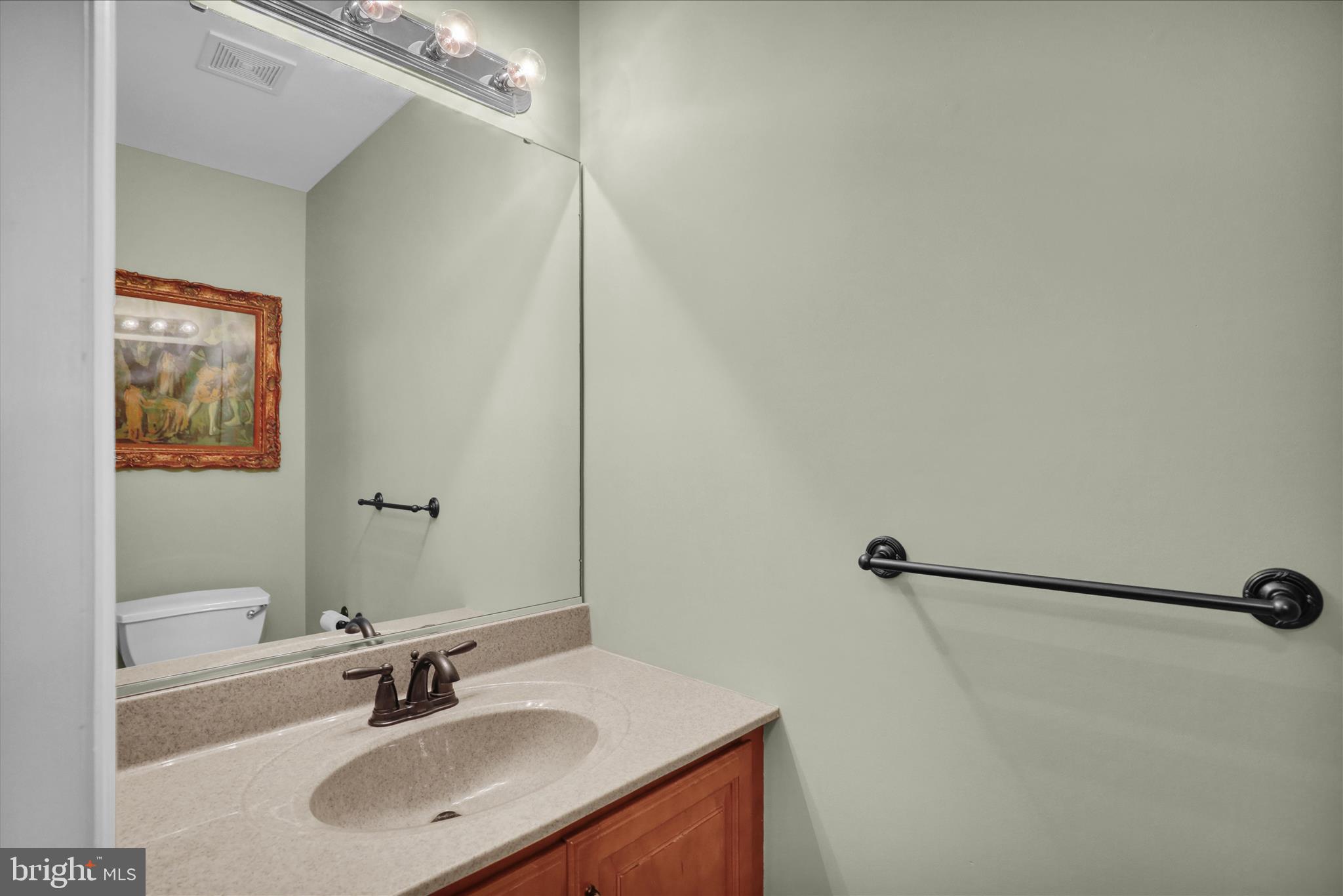 35 Pacific Avenue Sinking Spring, PA 19608 - Photo 21 of 63 a bathroom with a sink and a mirror