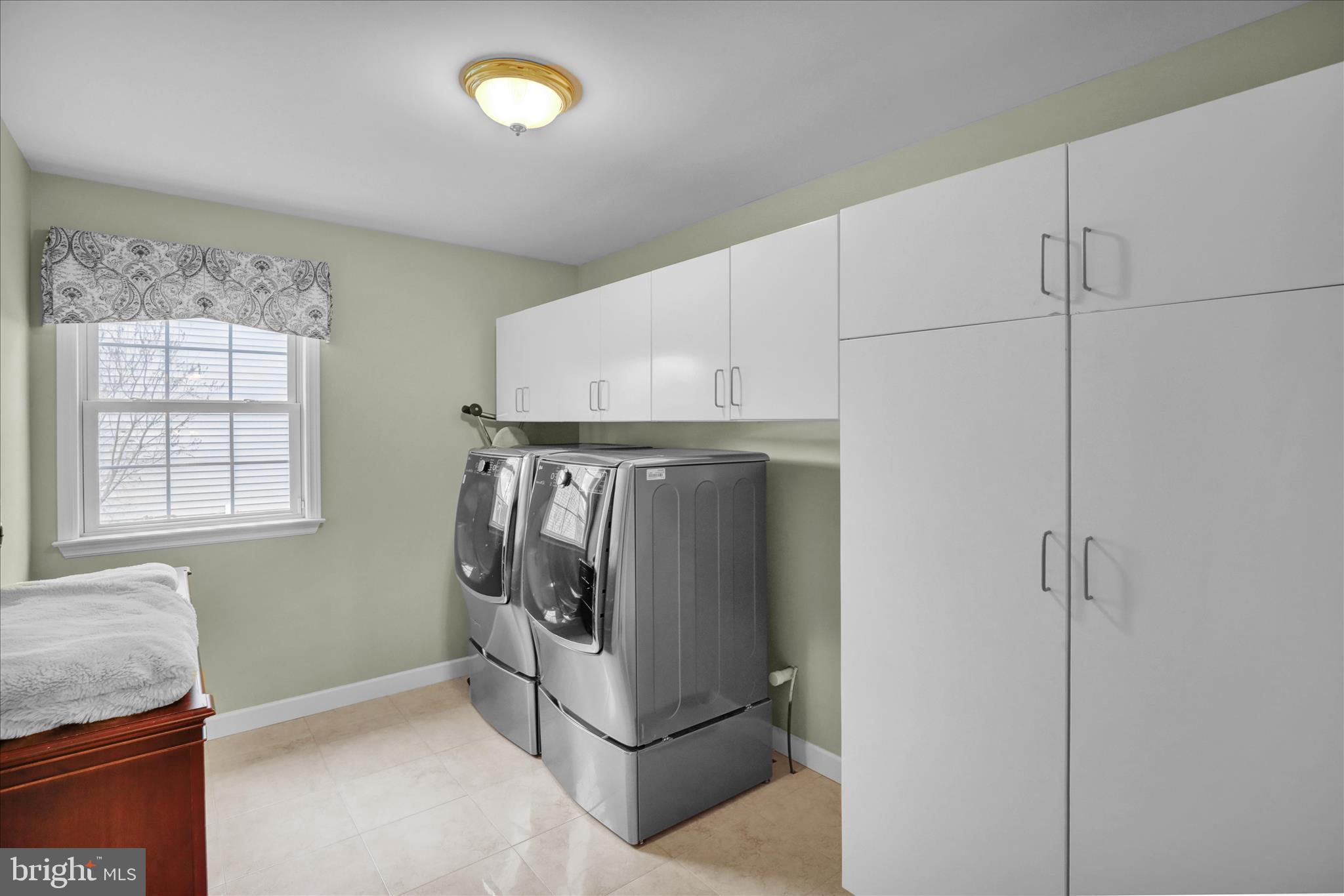 35 Pacific Avenue Sinking Spring, PA 19608 - Photo 22 of 63 a utility room with cabinets and washer