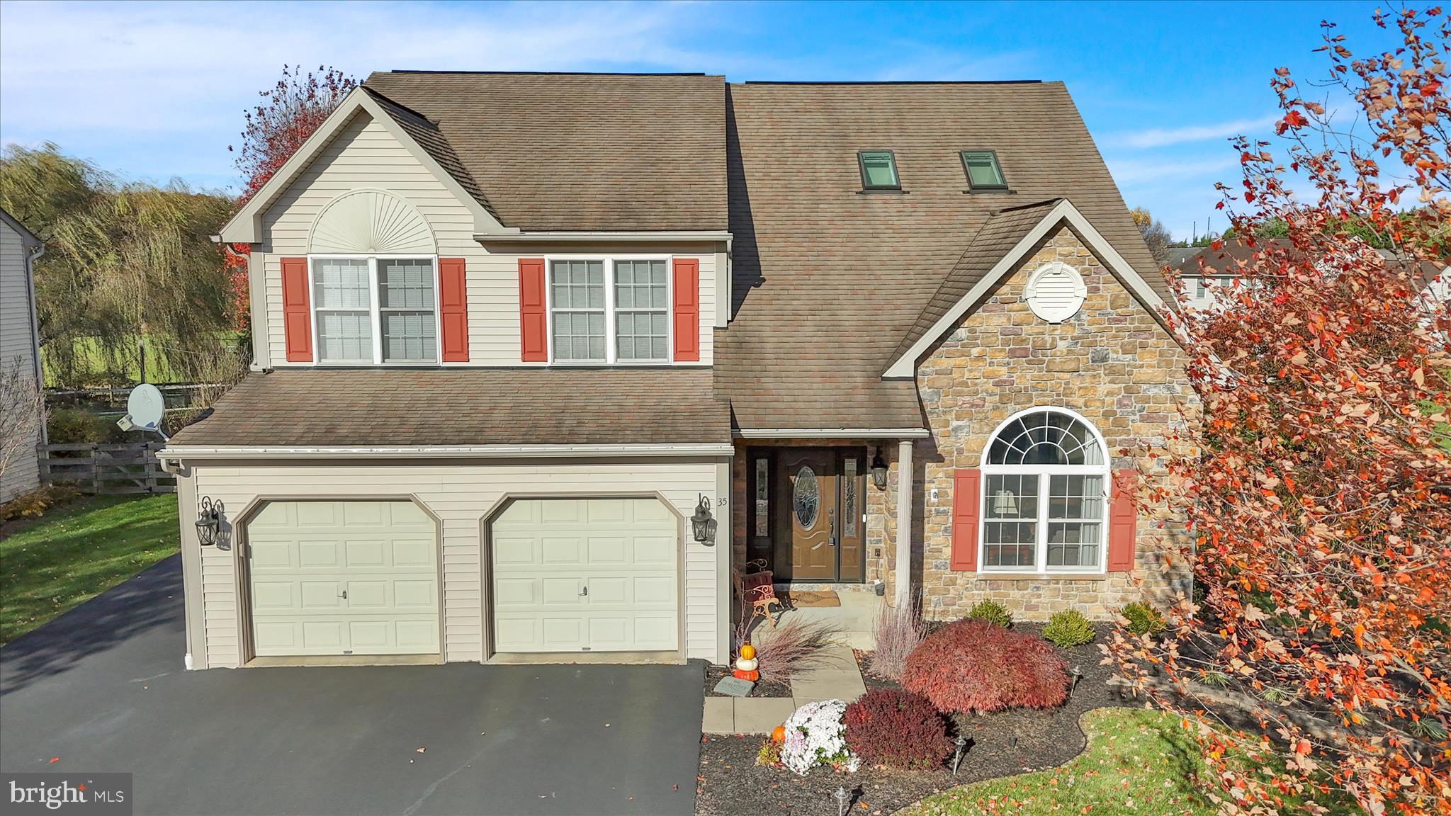 35 Pacific Avenue Sinking Spring, PA 19608 - Photo 3 of 63 a front view of a house with a garden
