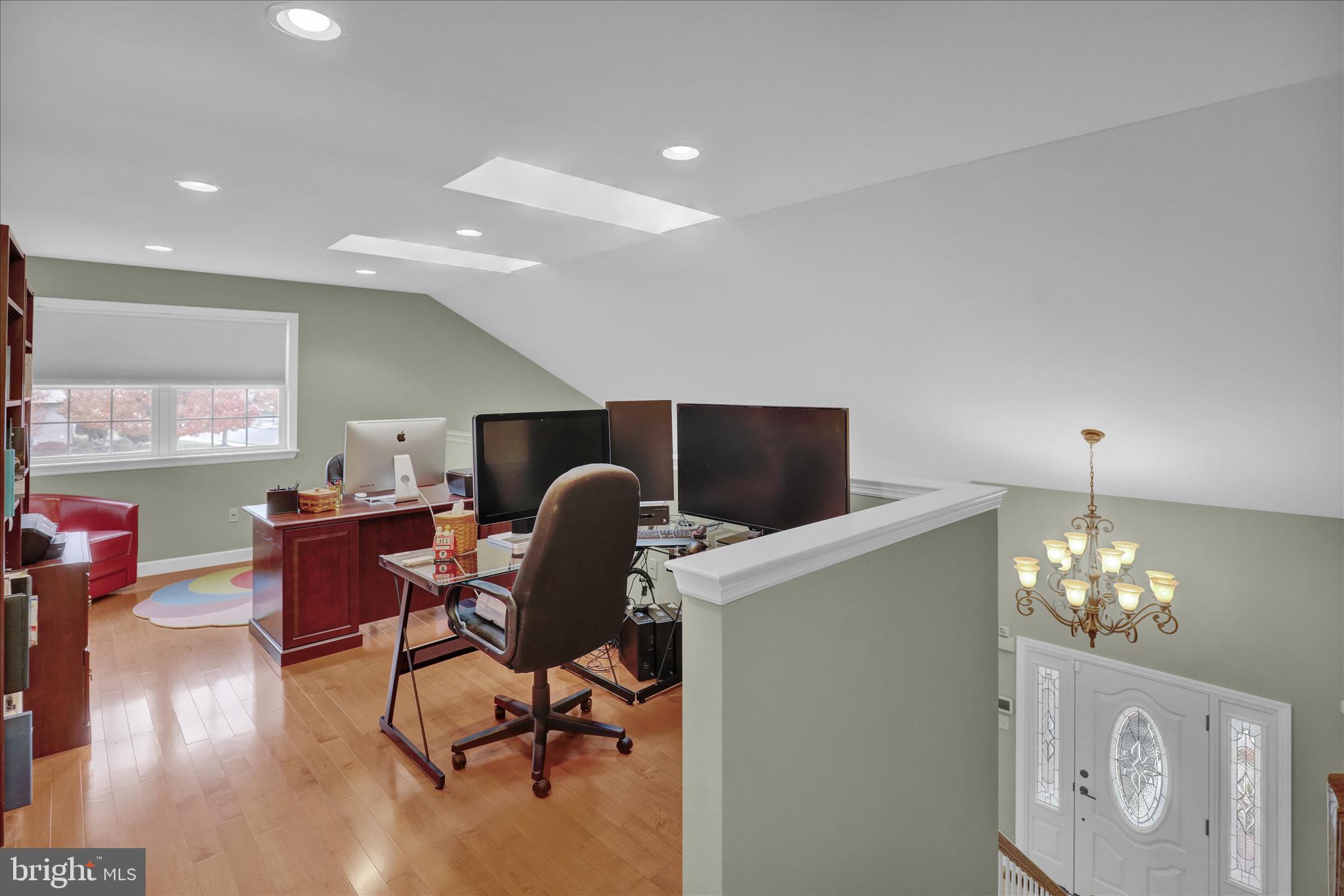 35 Pacific Avenue Sinking Spring, PA 19608 - Photo 32 of 63 a view of a dining room with furniture a chandelier and wooden floor