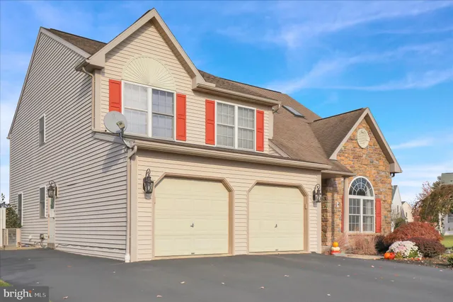 a view of a house with a garage