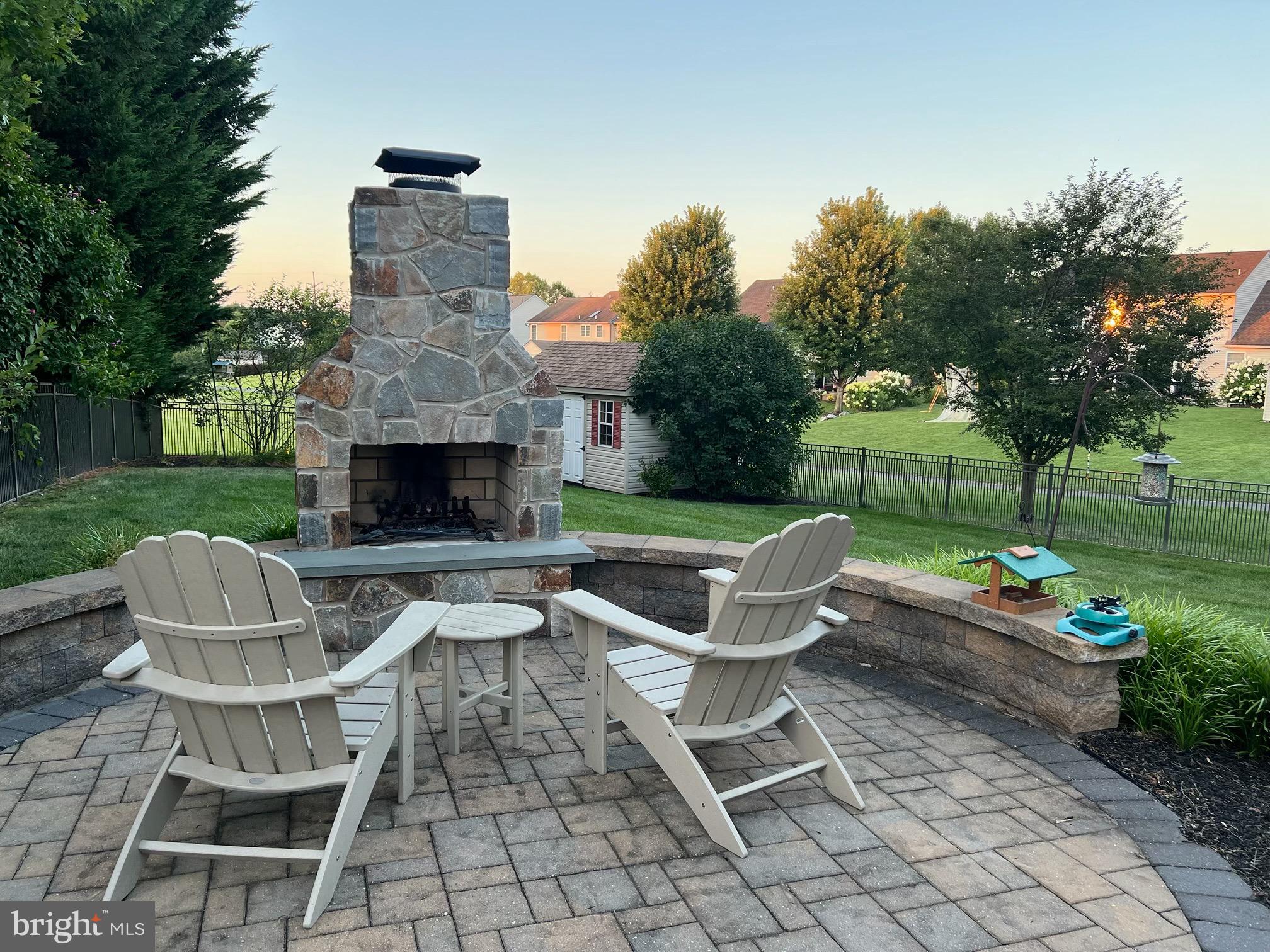 35 Pacific Avenue Sinking Spring, PA 19608 - Photo 5 of 63 a view of a patio with a table and chairs