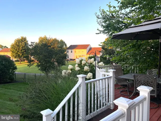 a view of a two chairs on the roof deck