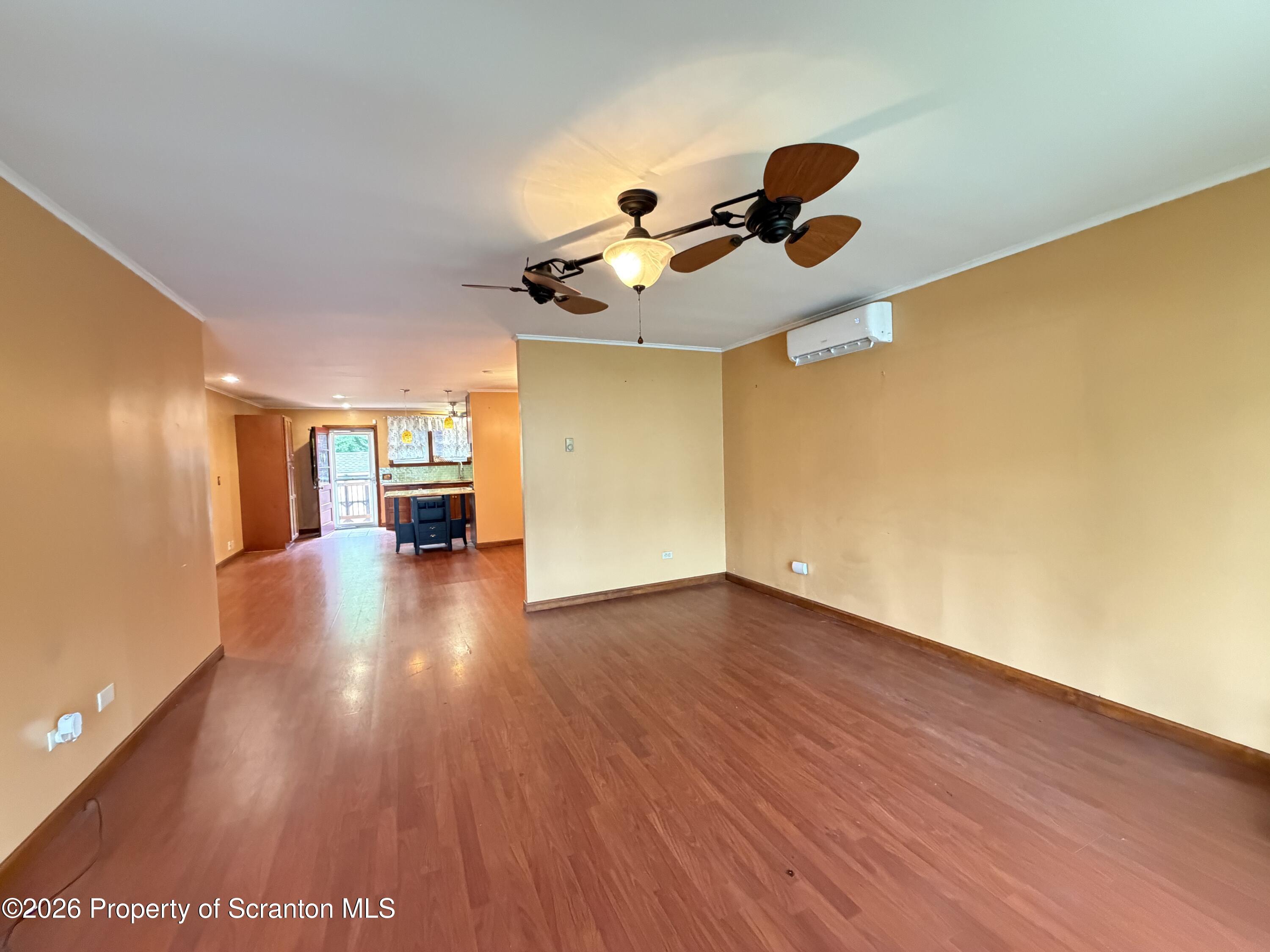 1019 Moosic Street Scranton, PA 18505 - Photo 5 of 43 a view of an empty room with wooden floor
