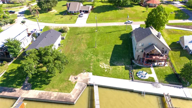 an aerial view of a house with a swimming pool