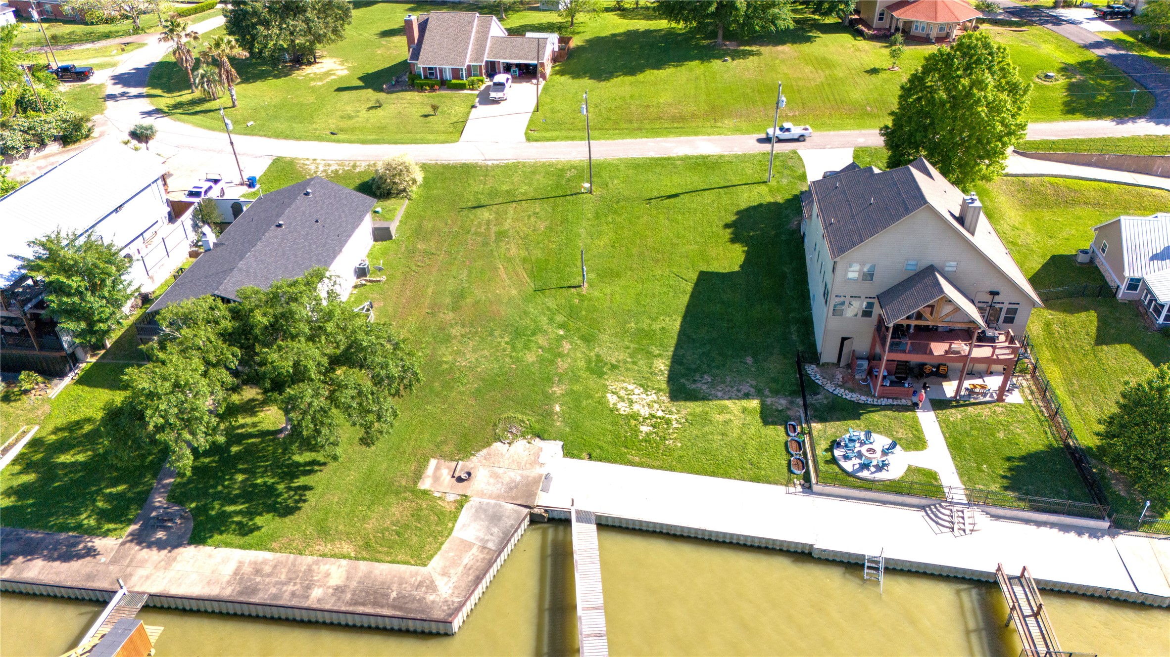 an aerial view of a house with a swimming pool