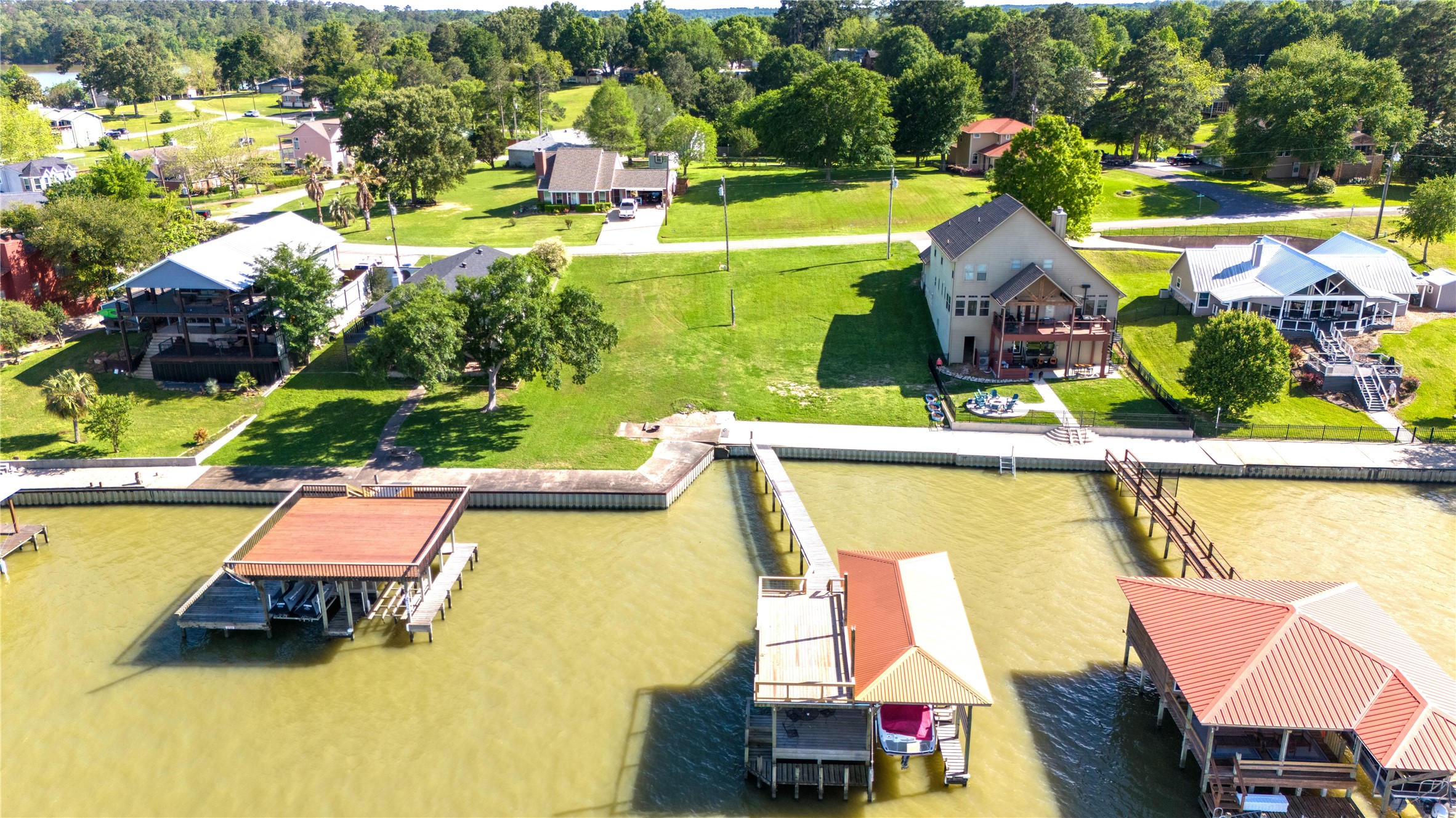 Tbd Lakeview Dr Loop Coldspring, TX 77331 - Photo 3 of 13 a view of a swimming pool with a yard and seating area