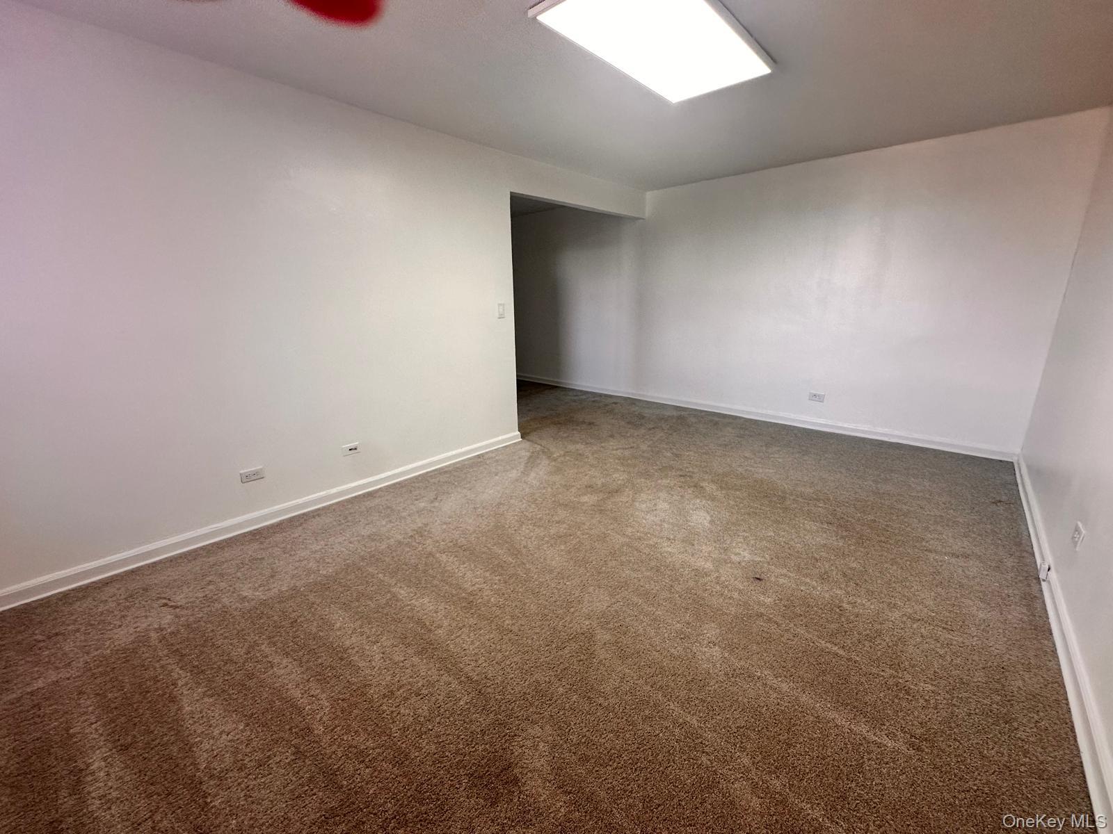 150-11 72nd Road, Unit 6F Queens, NY 11367 - Photo 15 of 31 an empty room with an entryway