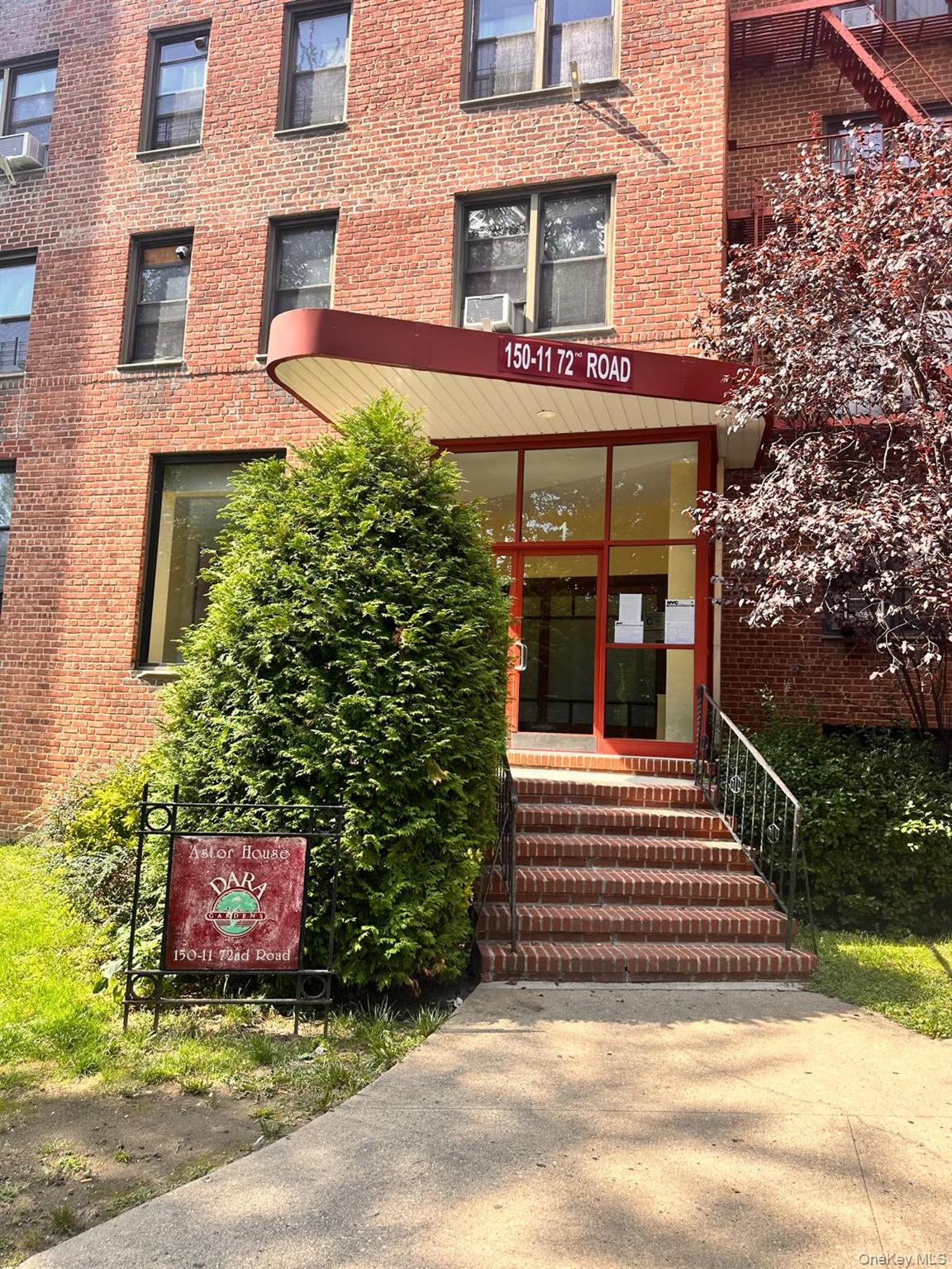 150-11 72nd Road, Unit 6F Queens, NY 11367 - Photo 2 of 31 a front view of a house with plants and garden