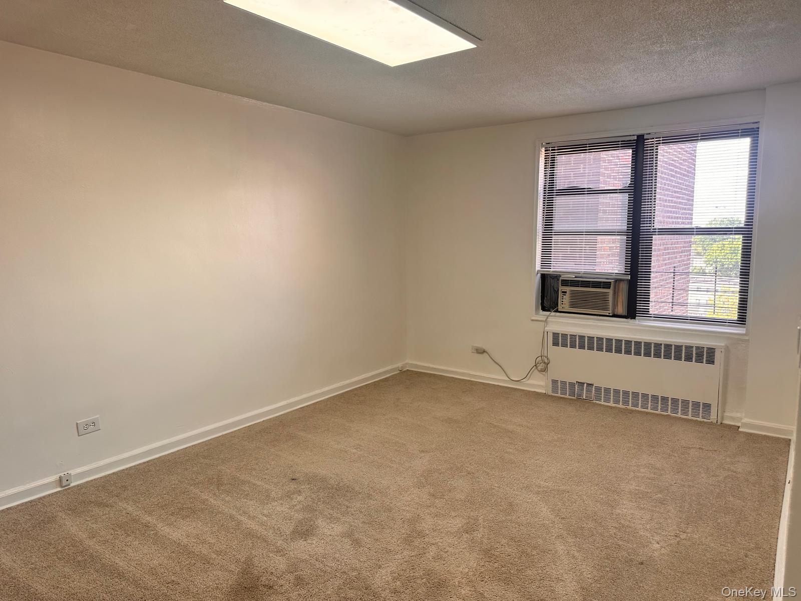 150-11 72nd Road, Unit 6F Queens, NY 11367 - Photo 31 of 31 an empty room with windows